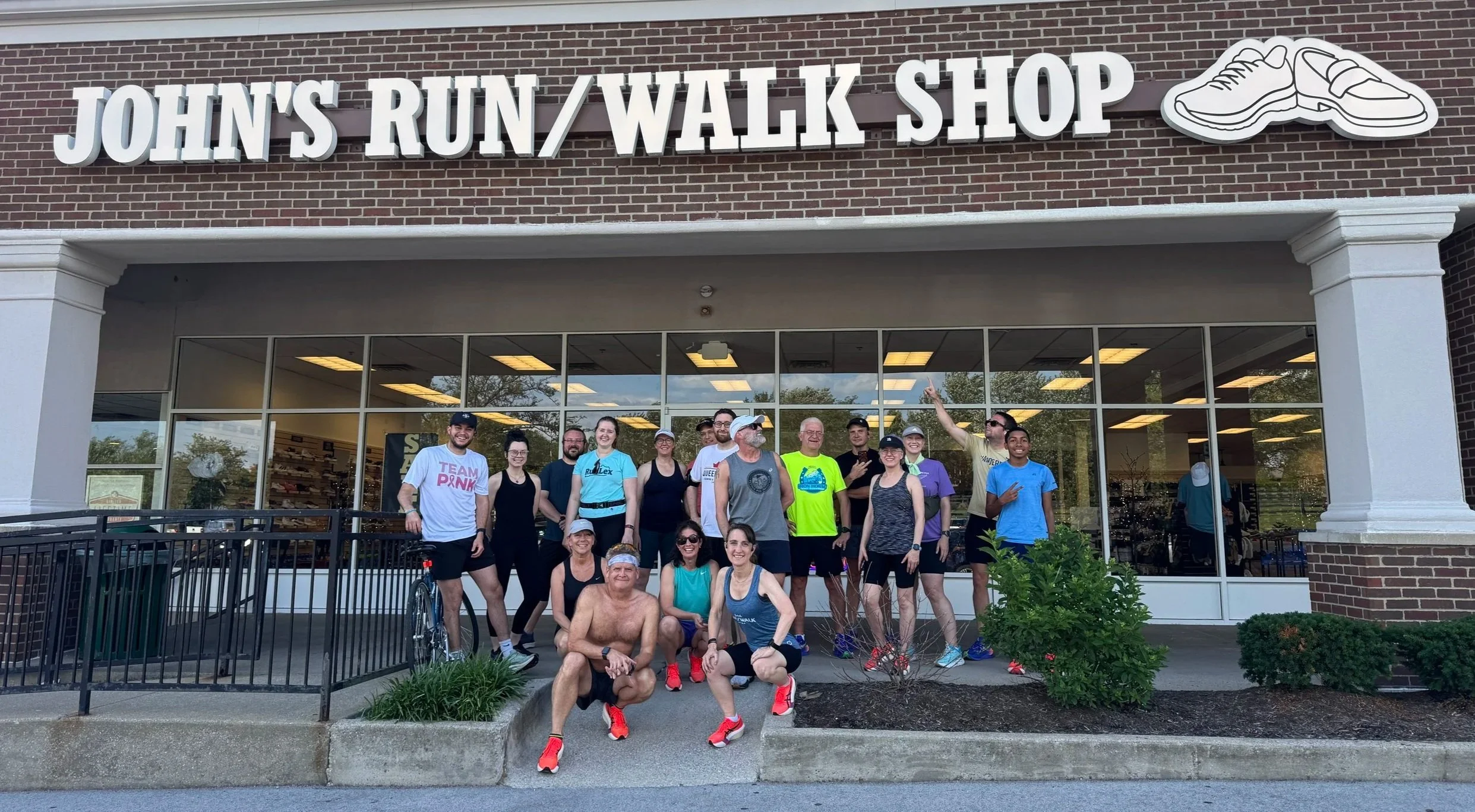 Group of runners outside John's Run/Walk Shop in Lexington, Ky