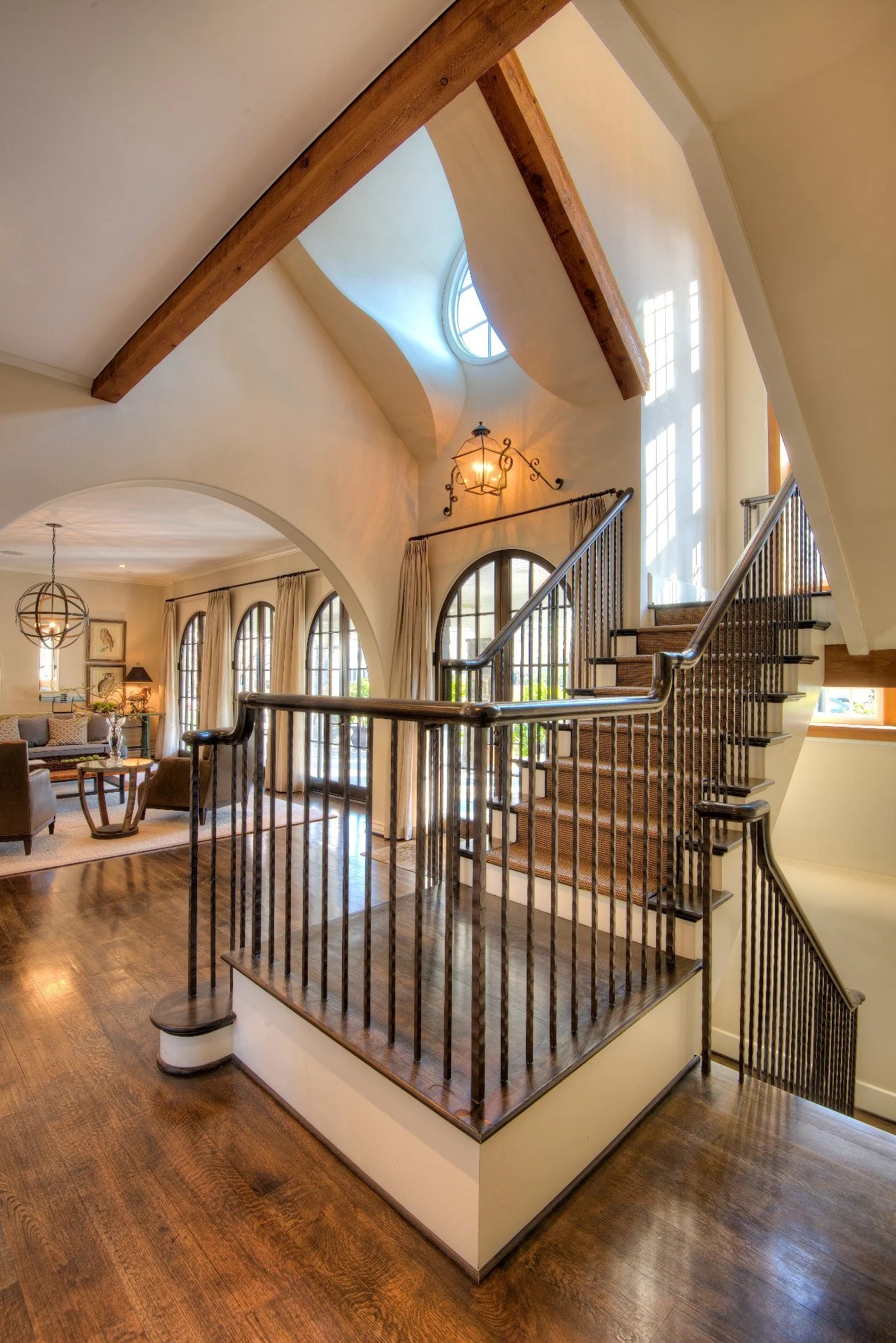 Staircase view with living room in the background.