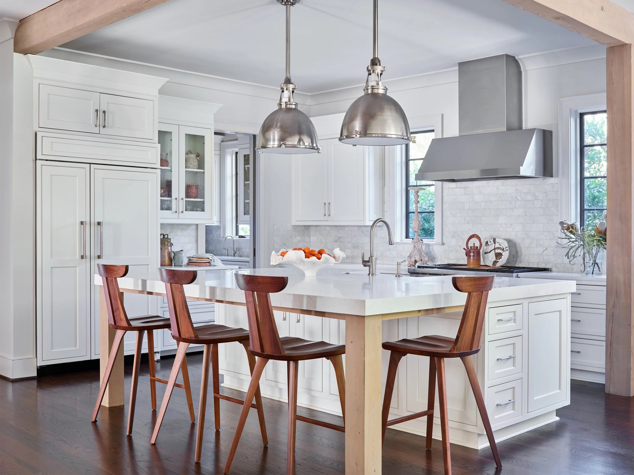 Kitchen area with seating around island.
