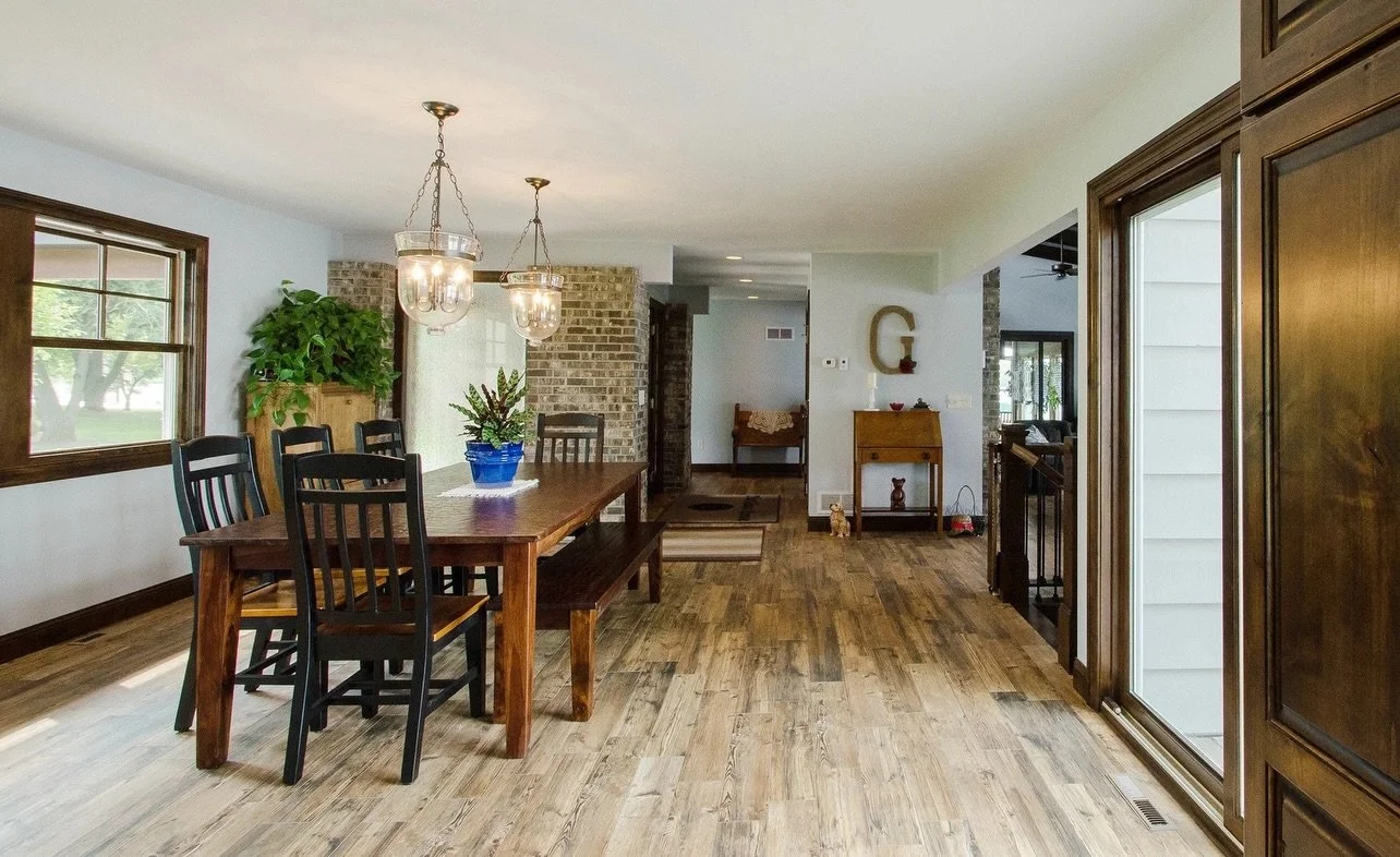 This already lovely cabin received a major transformation, including a kitchen, bath, and basement remodel, the addition of a guest suite in the garage, all new windows, a metal roof, and a rear overhang that provides the perfect shelter for the BBQ.