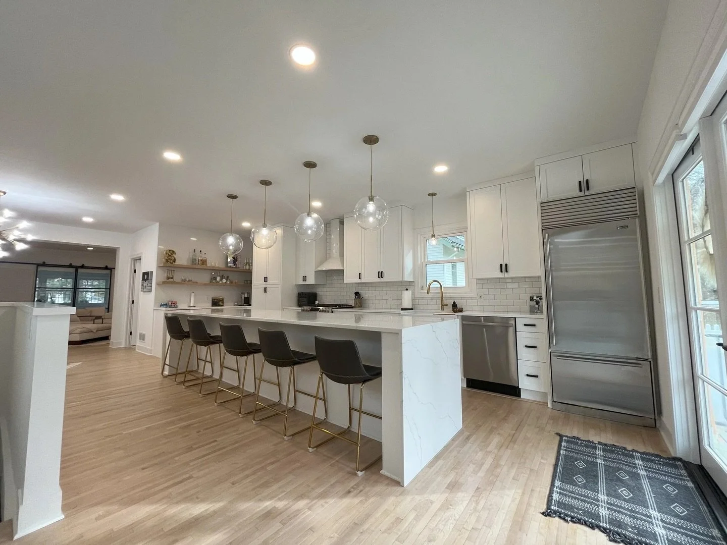 Renovating a century-old home comes with unique challenges, but through collaboration with the homeowners and the dedication of our crews, we were able to thoughtfully transform this historic Excelsior residence.

This project included a complete mai
