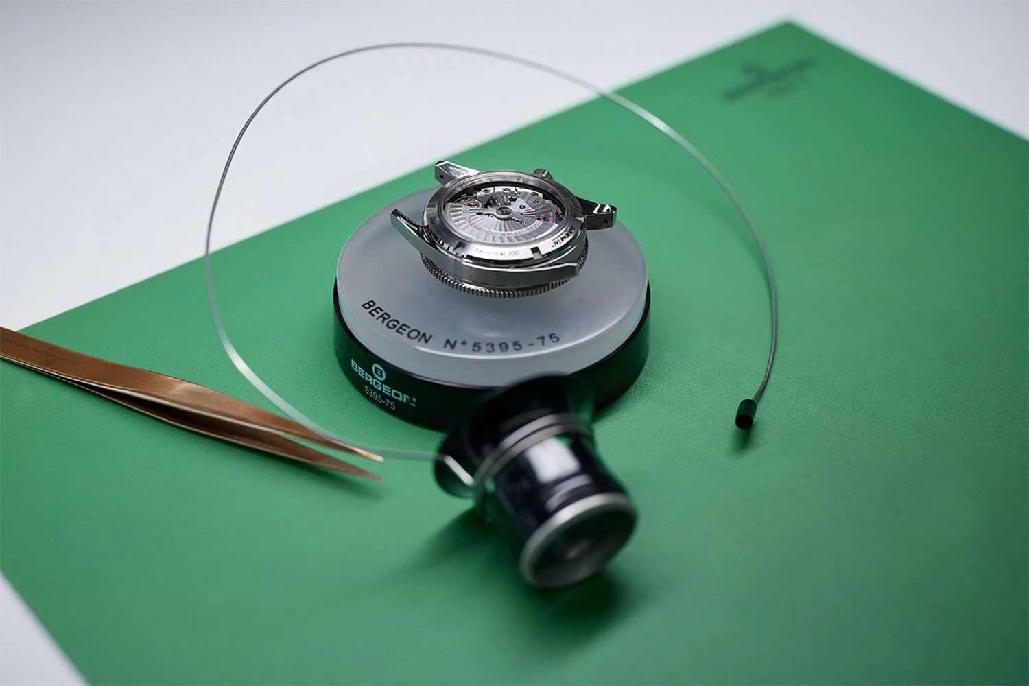 Close-up of an Omega Seamaster being serviced with Bergeon tools in the Watch Atelier at The Watch Barn. Technical photography by Matt Ankers for Chrono24.