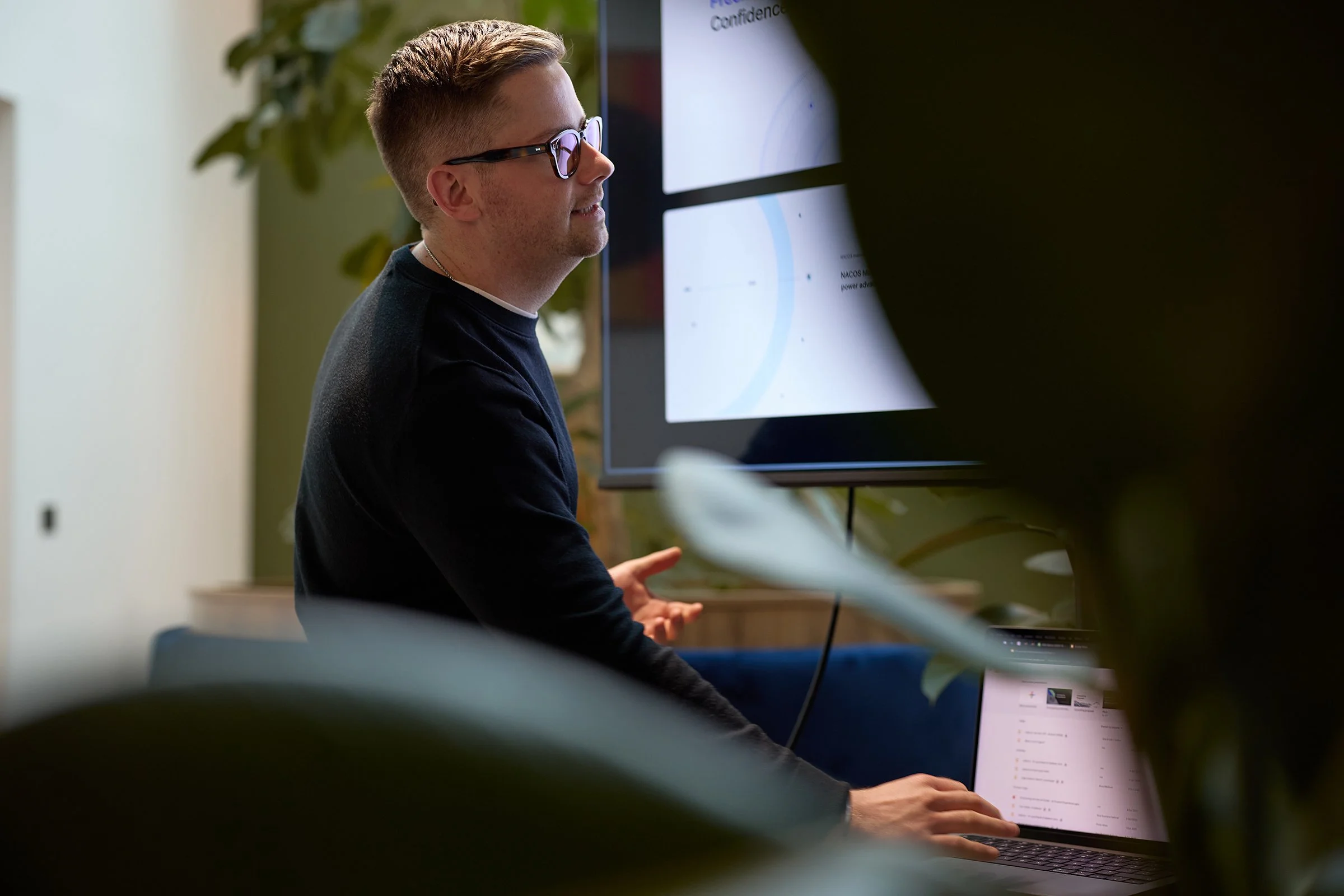 Jordan Richards, CEO and Founder of &above, delivering a keynote on AI design and creative tech at a London business event, captured by Matt Ankers Studio.