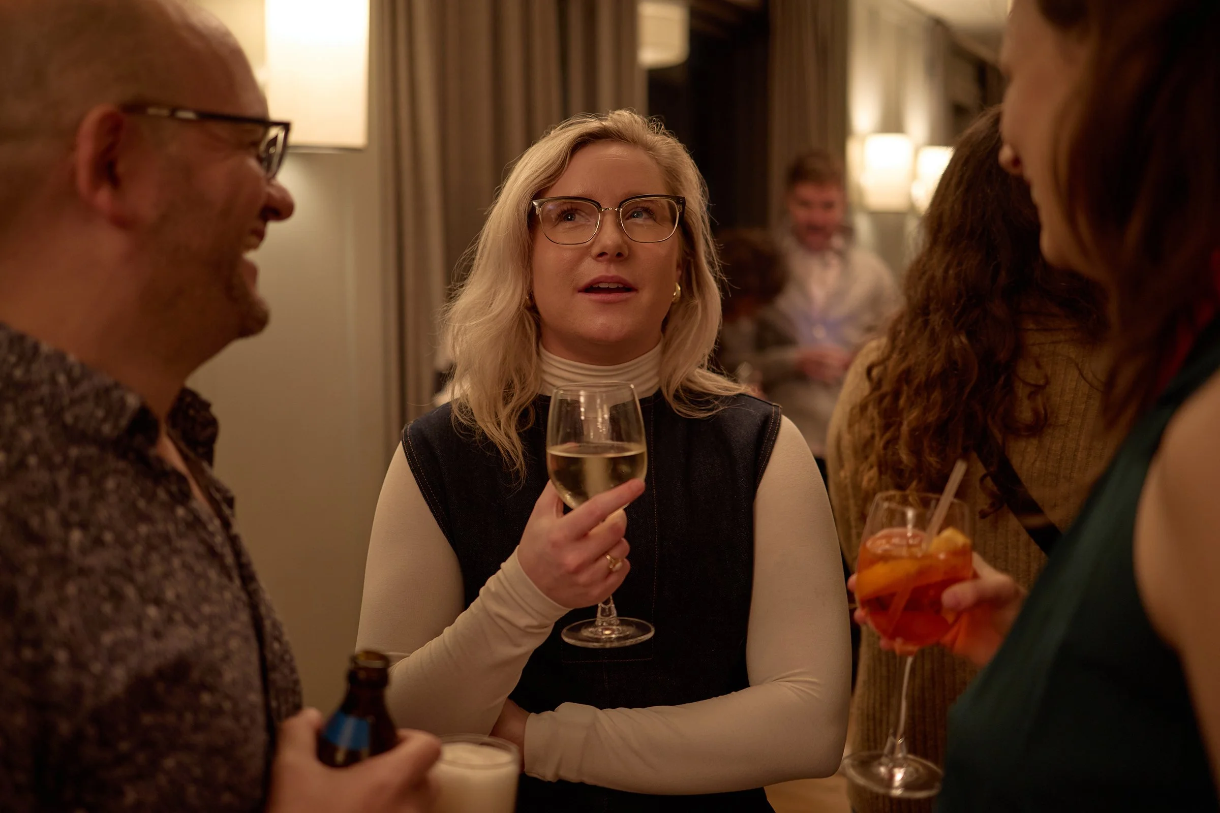 Candid lifestyle photography of guests socialising at the GetYourGuide partners event in Soho, London, capturing authentic corporate networking and hospitality.