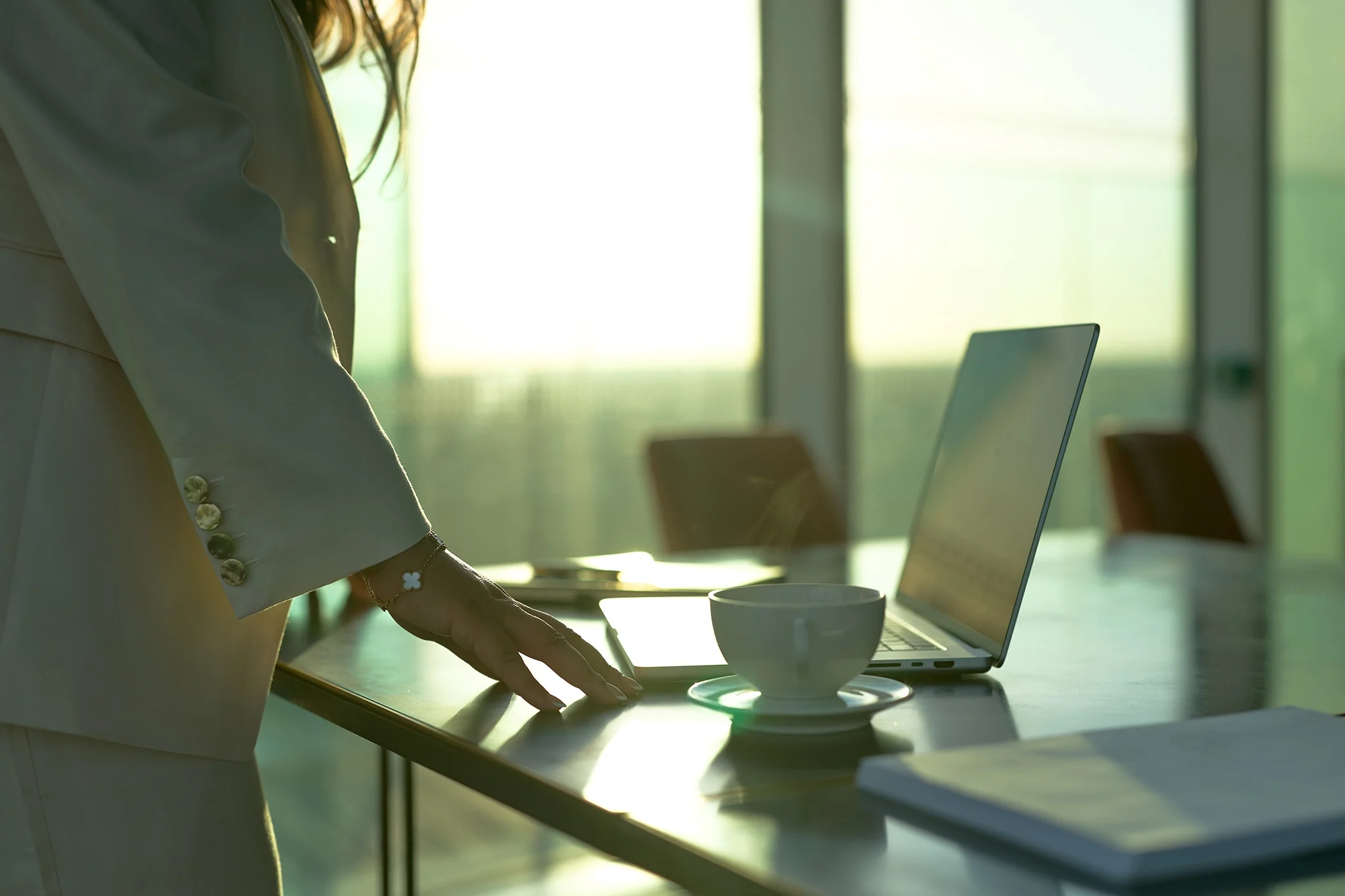 Business professional working on a laptop in a modern office