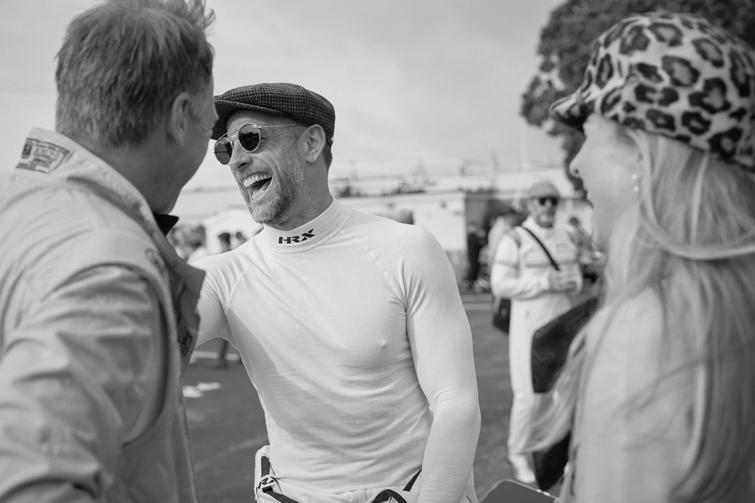 Jenson Button socialising in the paddock before a race at Goodwood Revival 2026