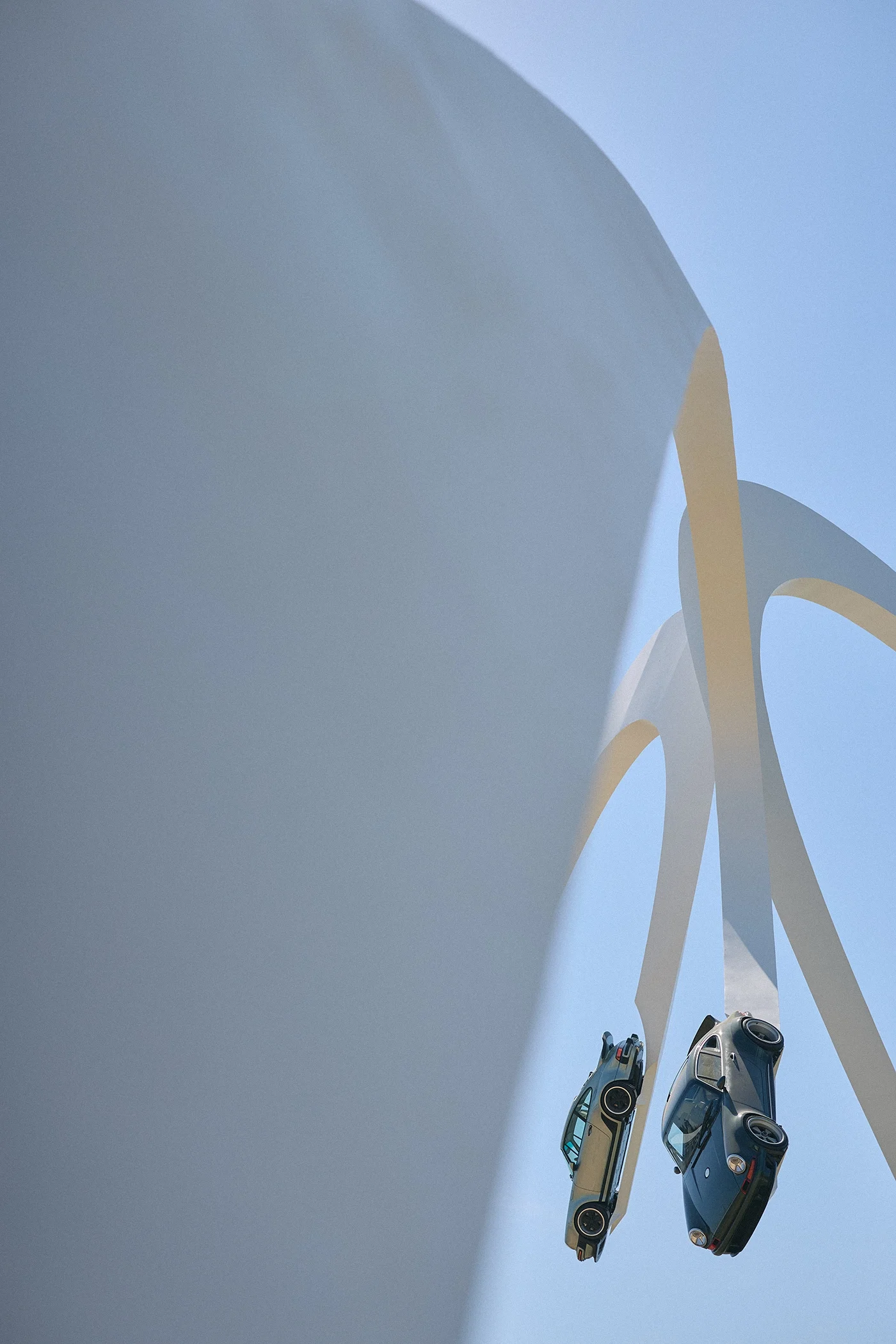 The Singer Central Feature sculpture outside Goodwood House at the 2026 Goodwood Festival of Speed, designed by Gerry Judah.