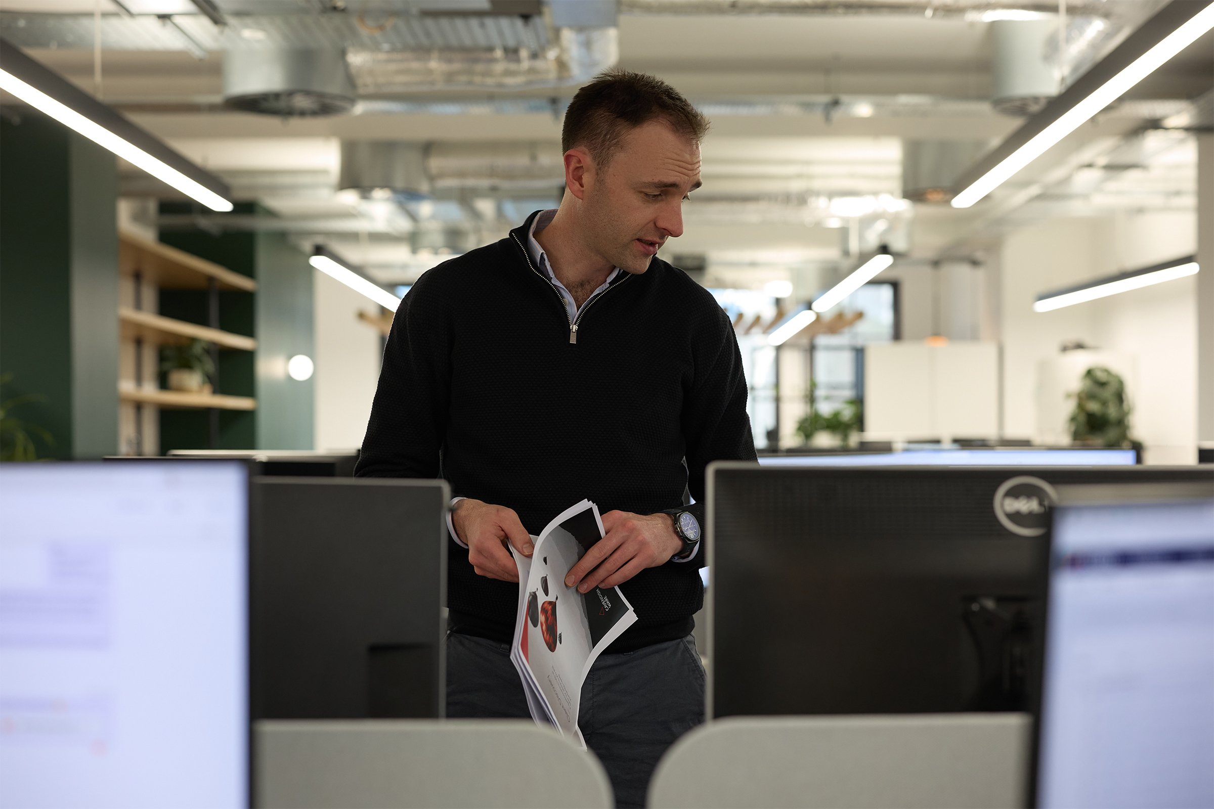 Commercial corporate photography at the Cavendish Ware London office, documenting the collaborative team culture of a boutique financial planning firm.