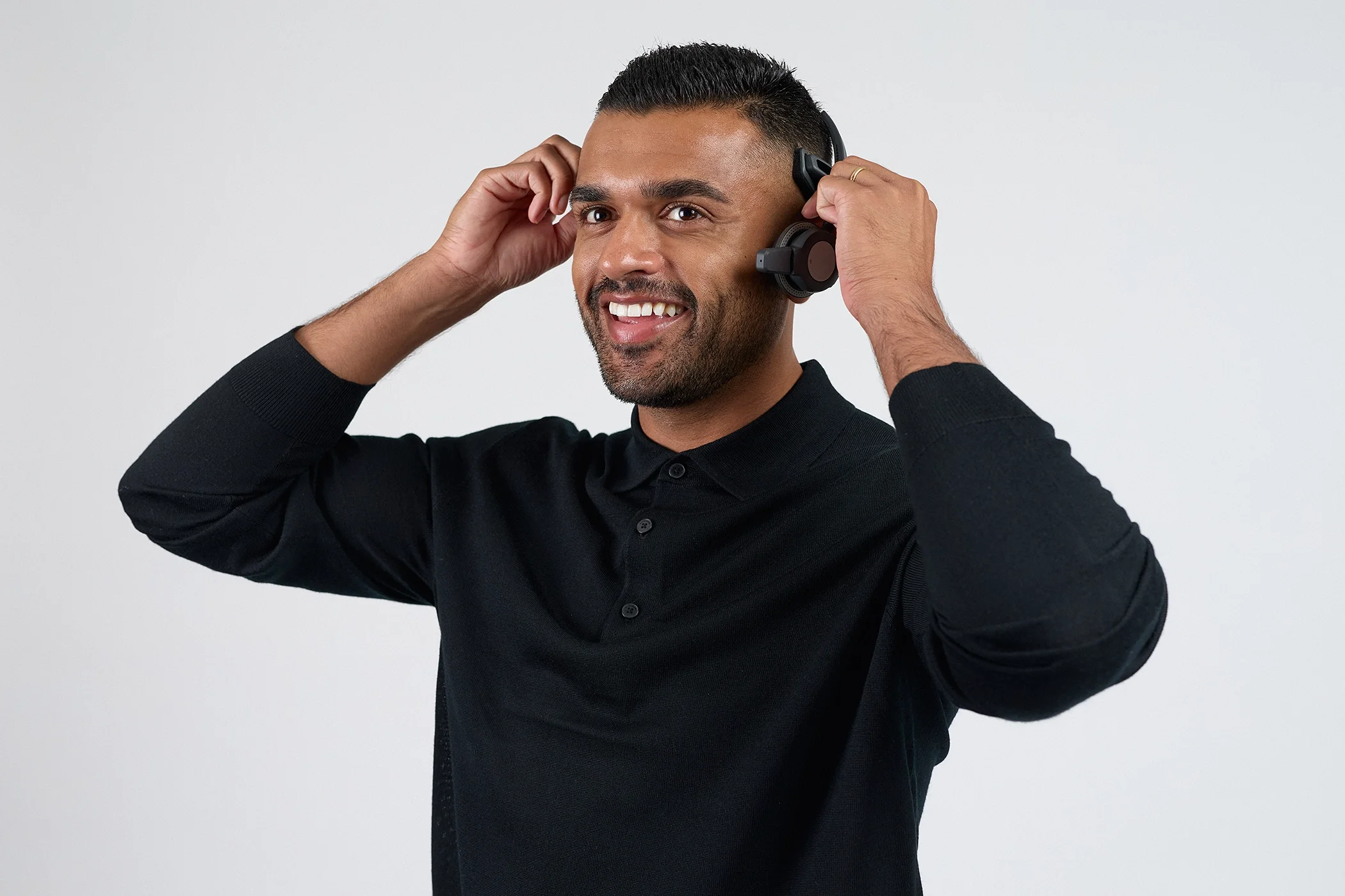 Lifestyle product photography of a model wearing a VoCoVo communication headset.