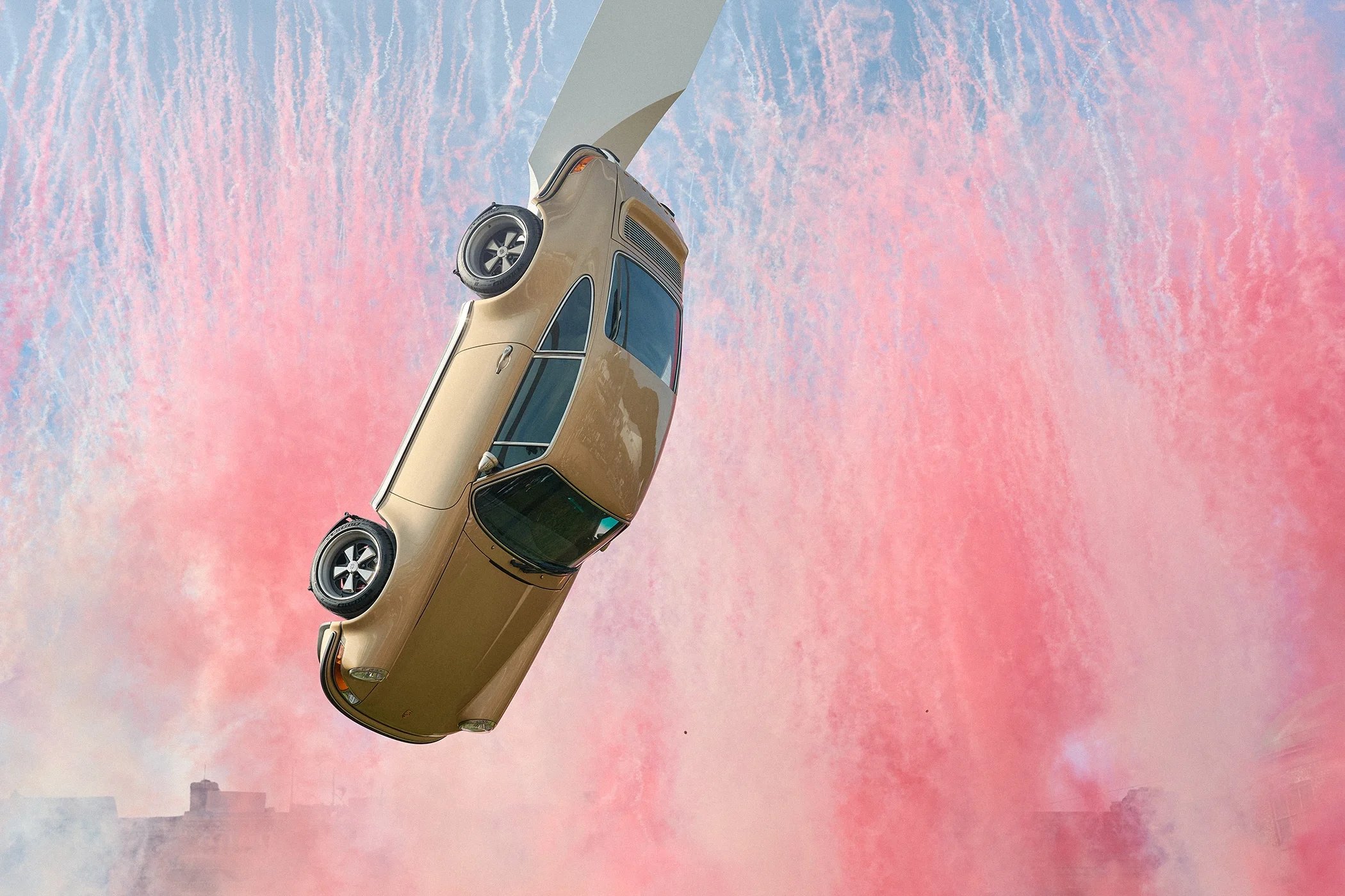 Singer vehicle featured at the Central Feature with smoke and fireworks during the 2026 Goodwood Festival of Speed.