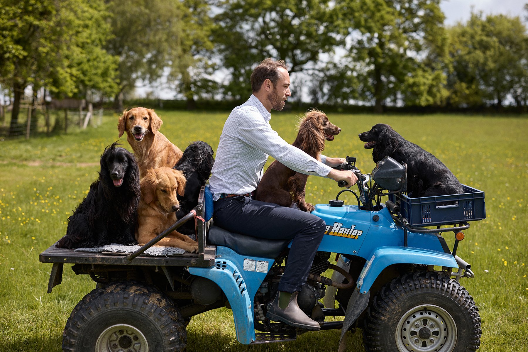 James Middleton on a quad bike with his dogs. Lifestyle photography for the pet food brand James & Ella