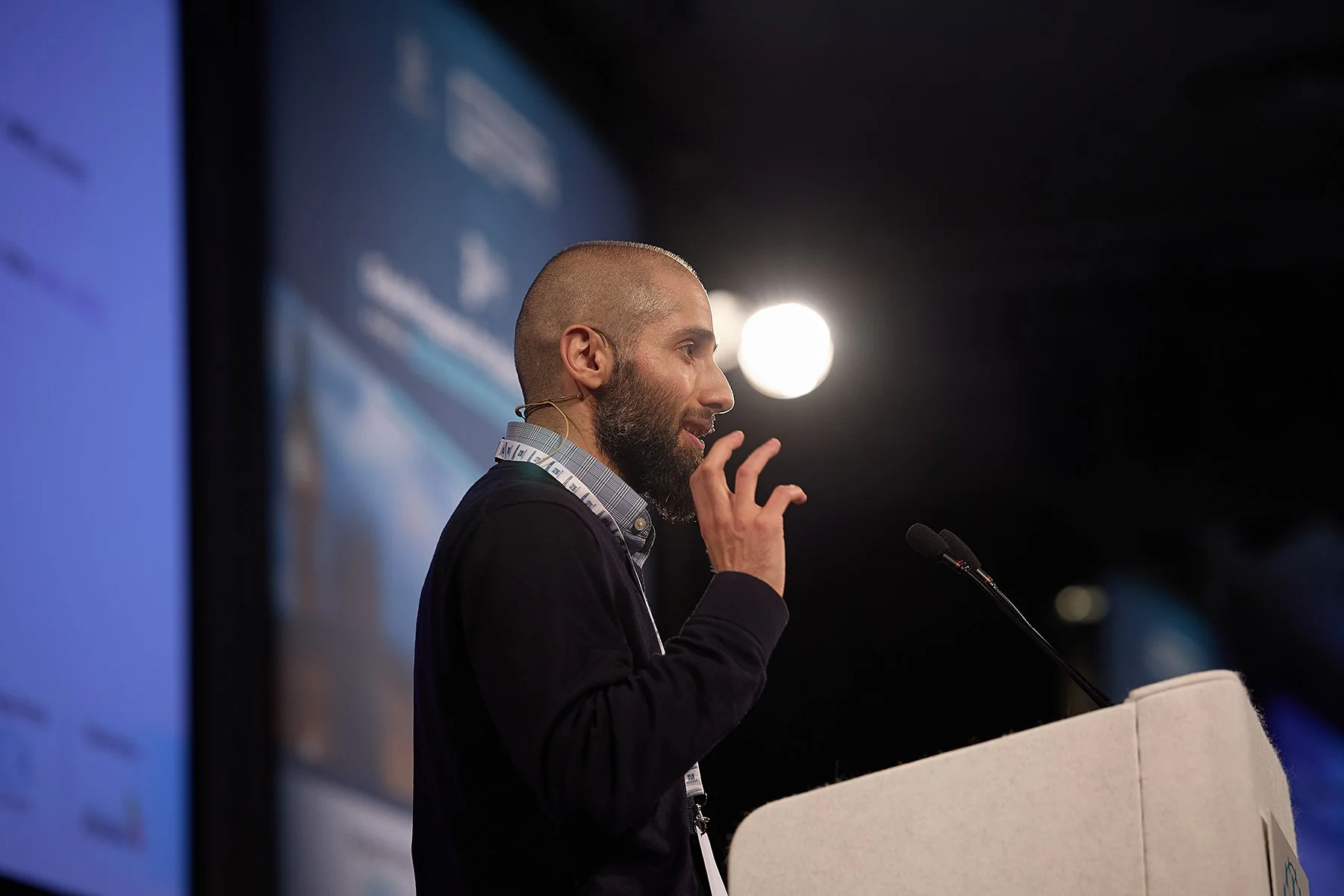 Dr. Muhammad Meki, Associate Professor at the University of Oxford, delivering a keynote on equity capital at the Al Baraka Summit in London, captured by Matt Ankers Studio.