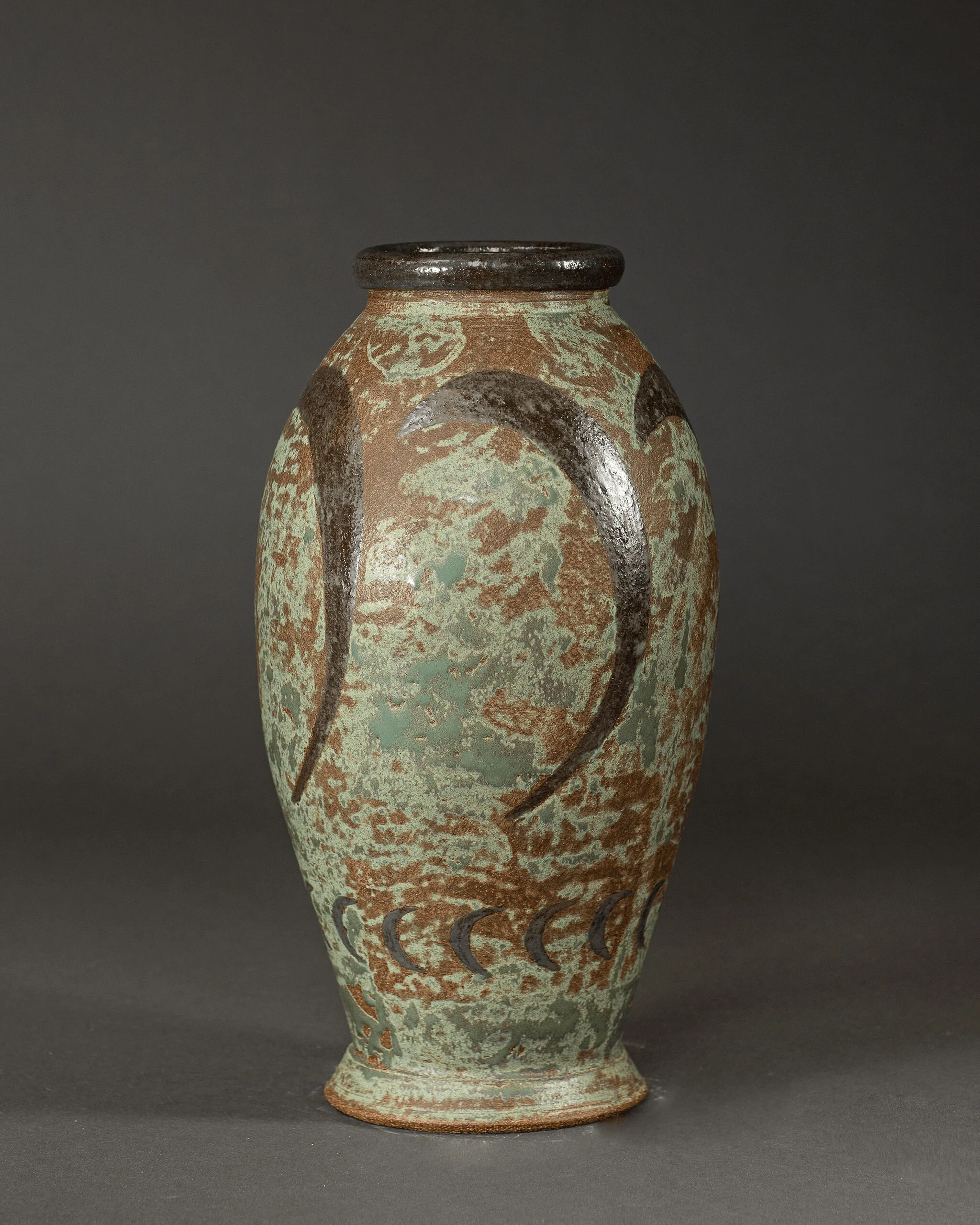 Greenish-brown ceramic vase with mottled textured glaze