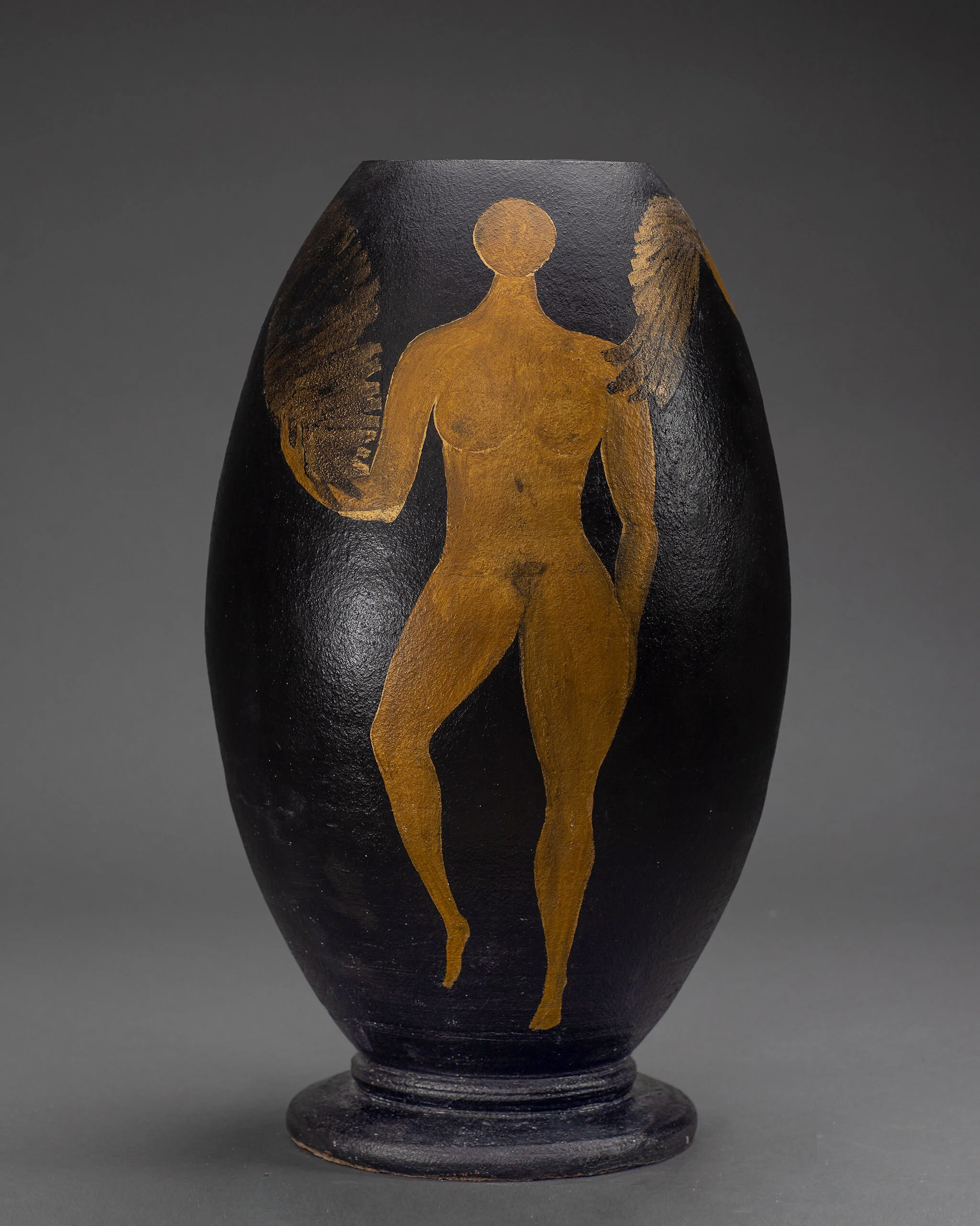 Black ceramic vase decorated with golden human figure design