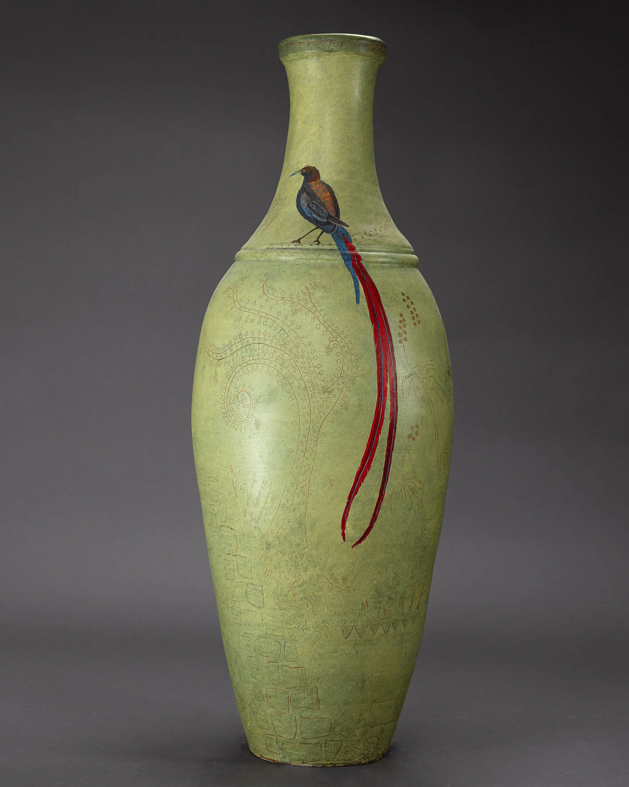 Decorative clay vase with symbolic bird motif design