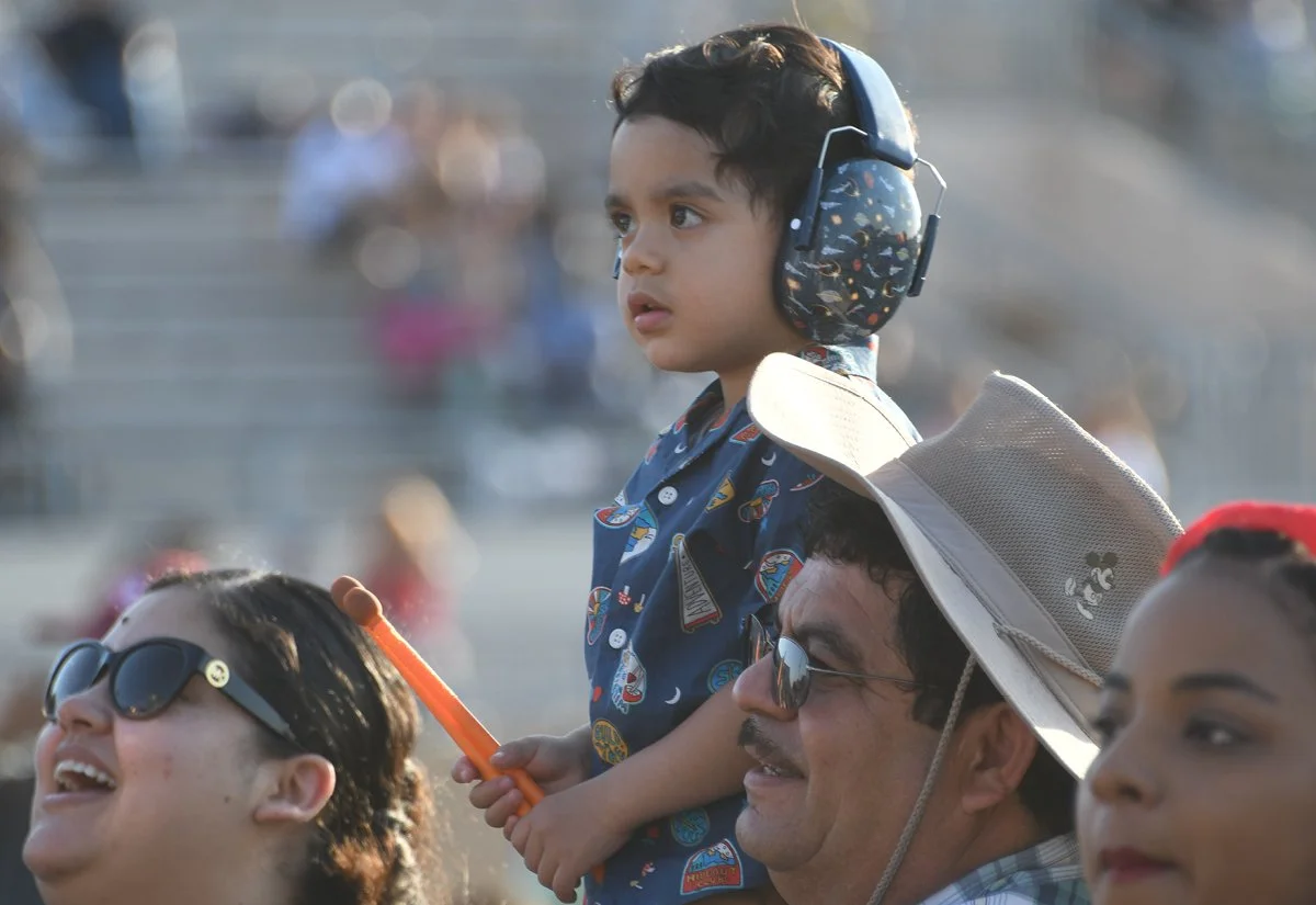   A family participates during worship  