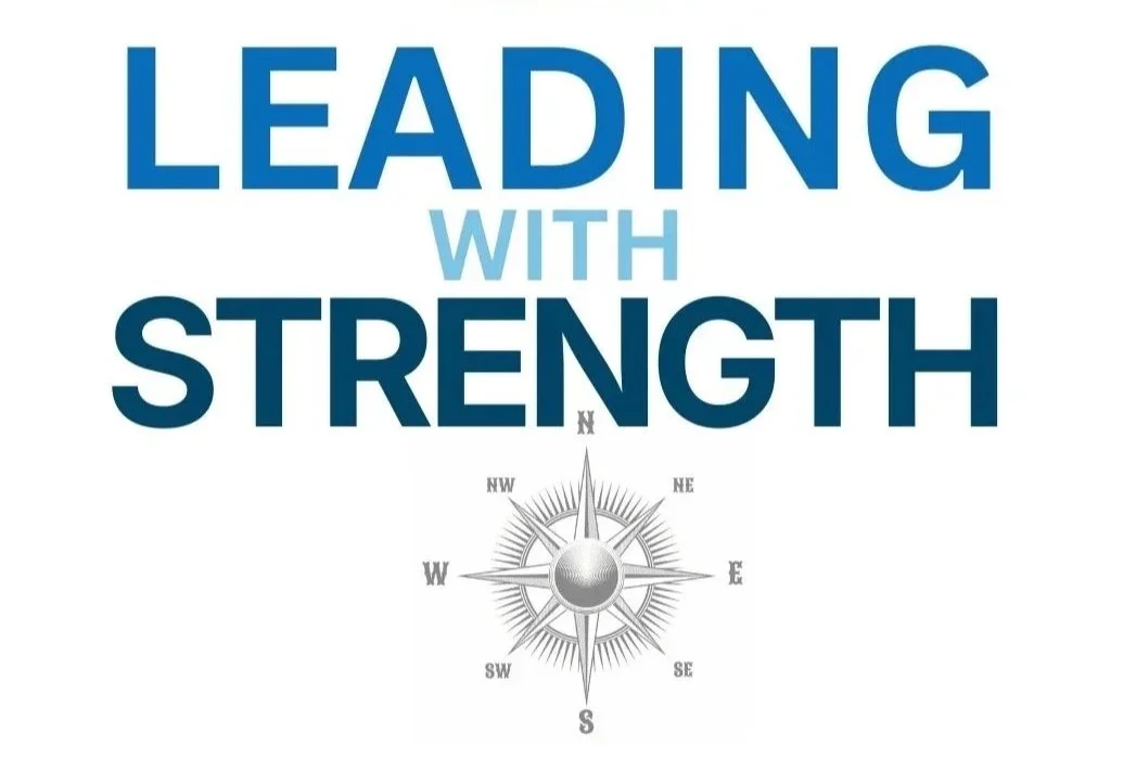 Text reading "Leading with Strength" and a compass rose graphic.