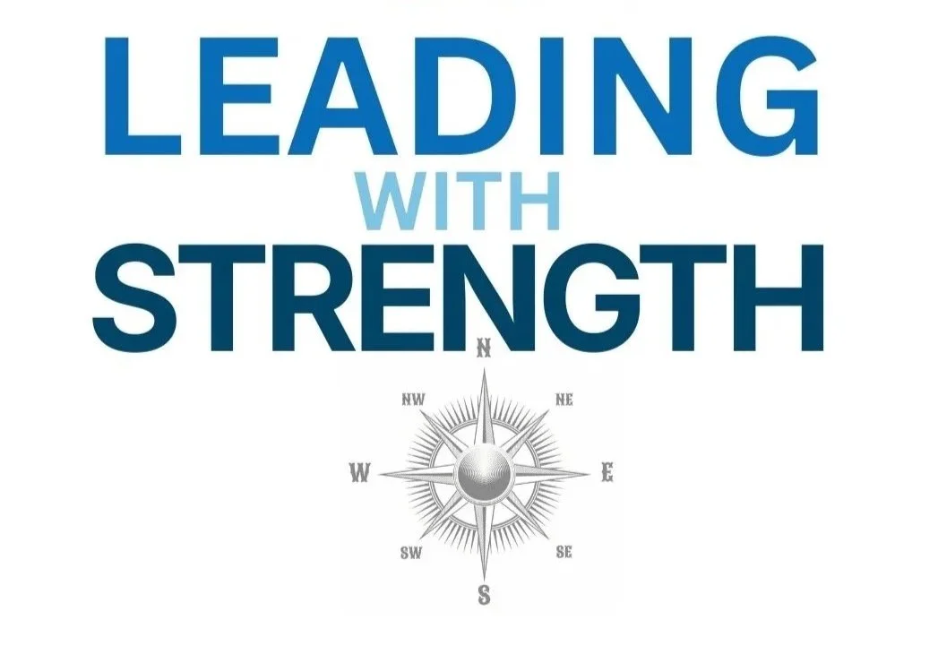 Text reads 'Leading with Strength' with a compass graphic below.
