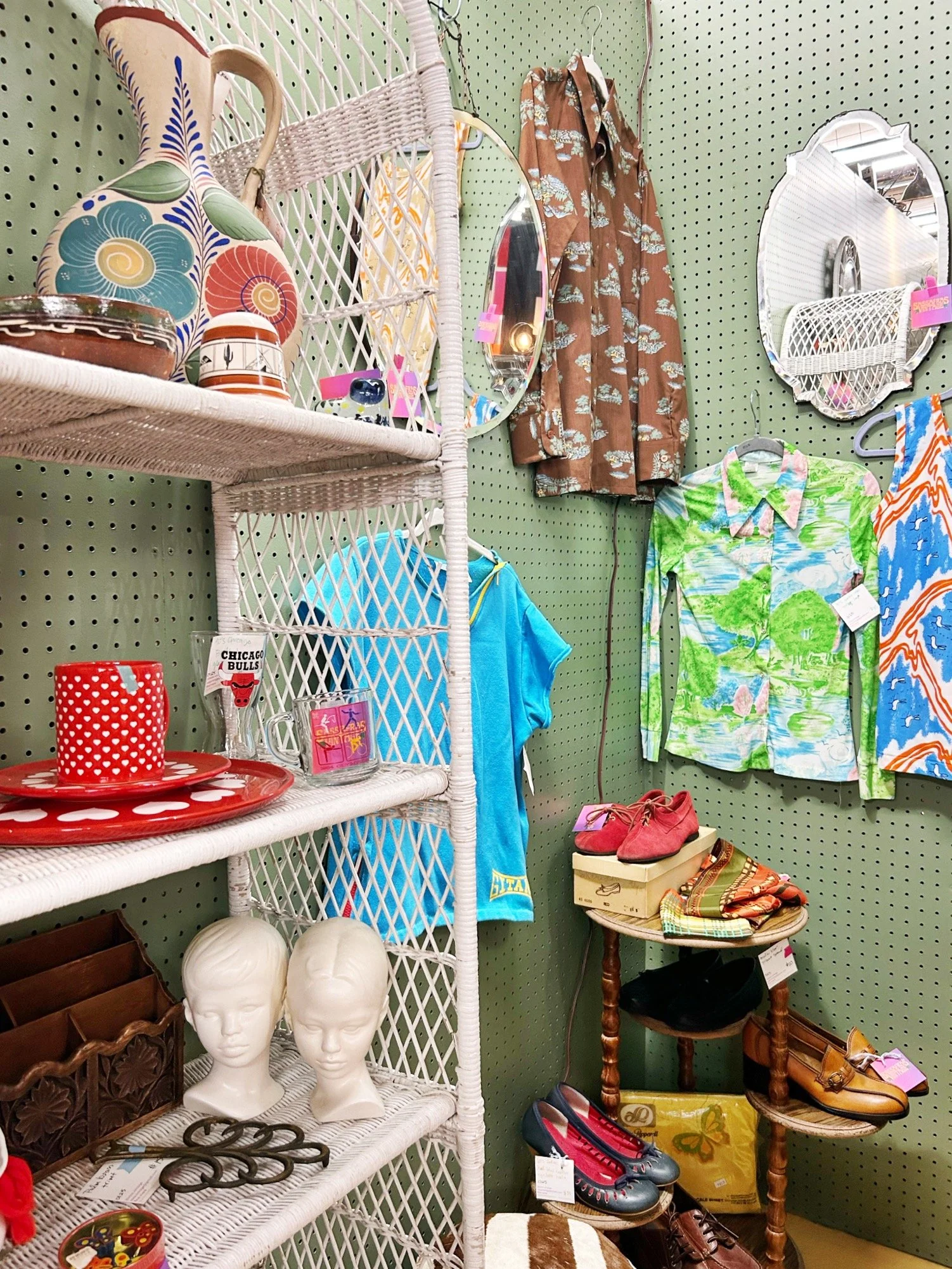Thrift store interior with organized shelves in morning light