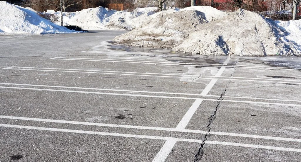 How Winter Weather Affects Commercial Concrete Parking Lots