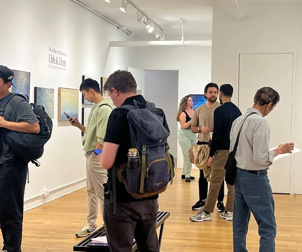 Visitors at Heather Stivison-Ebb & Flow exhibit play exhibition music from phones.jpeg