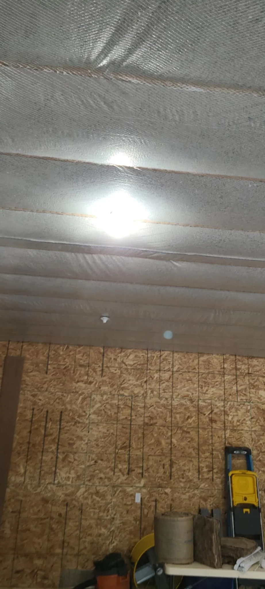 Bib and blown cellulose garage ceiling