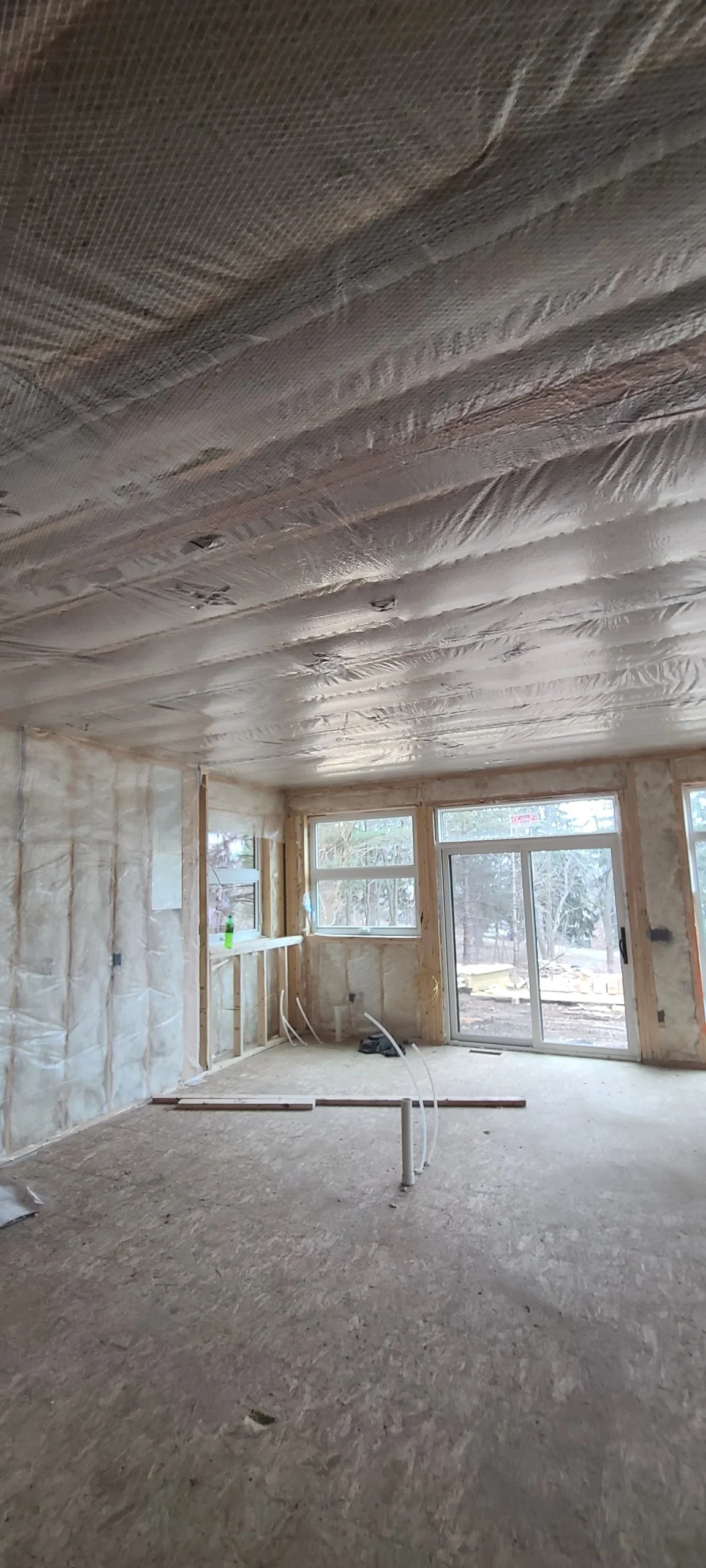 Fiberglass batting in the walls with a bibbed and blown cellulose ceiling