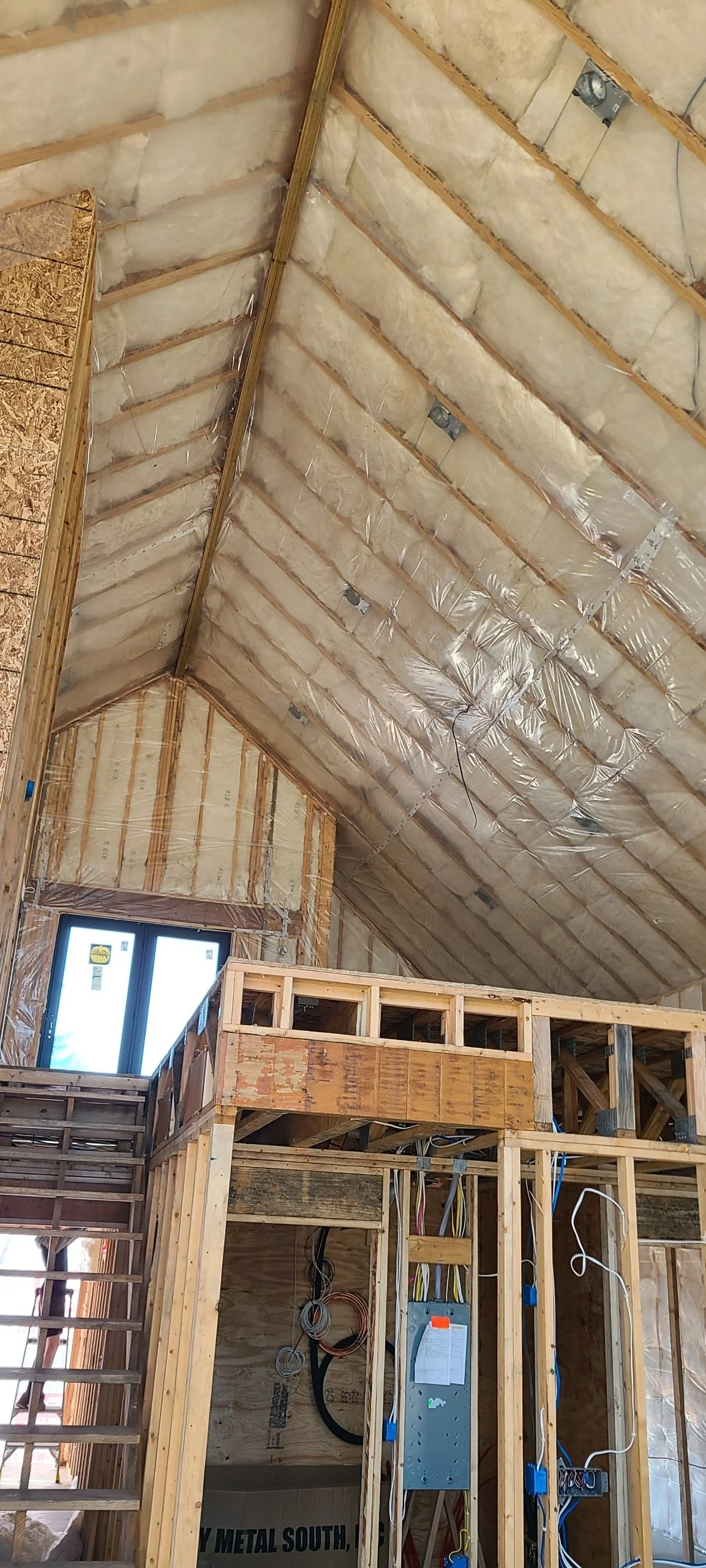 Fiberglass batting in a 12/12 pitched vaulted ceiling