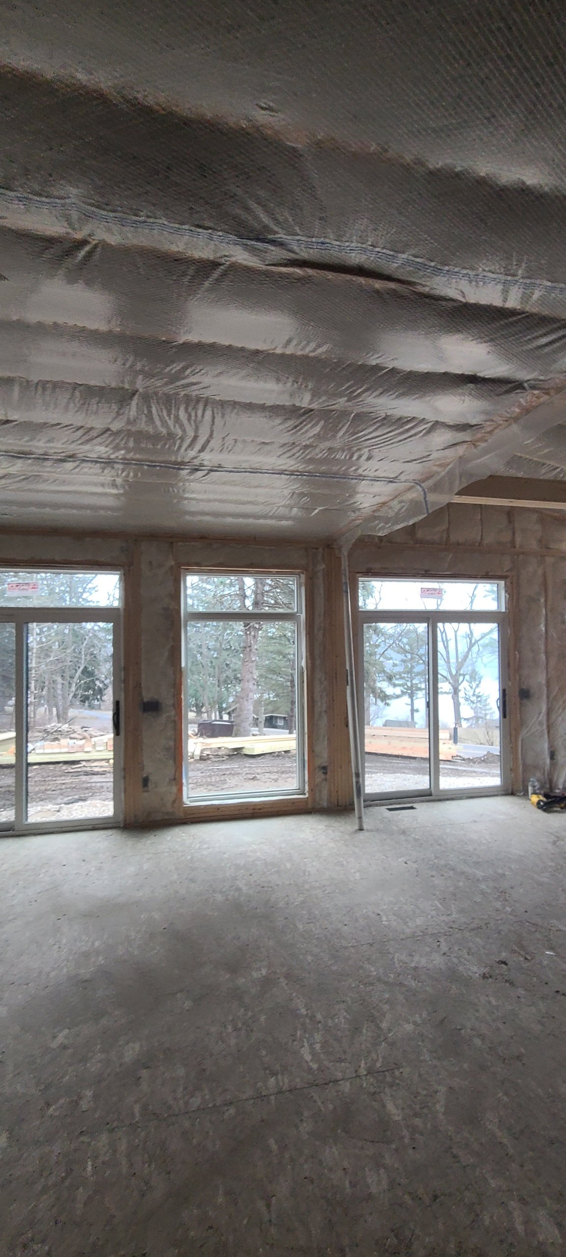 Fiberglass batting in the walls with a bibbed and blown cellulose ceiling