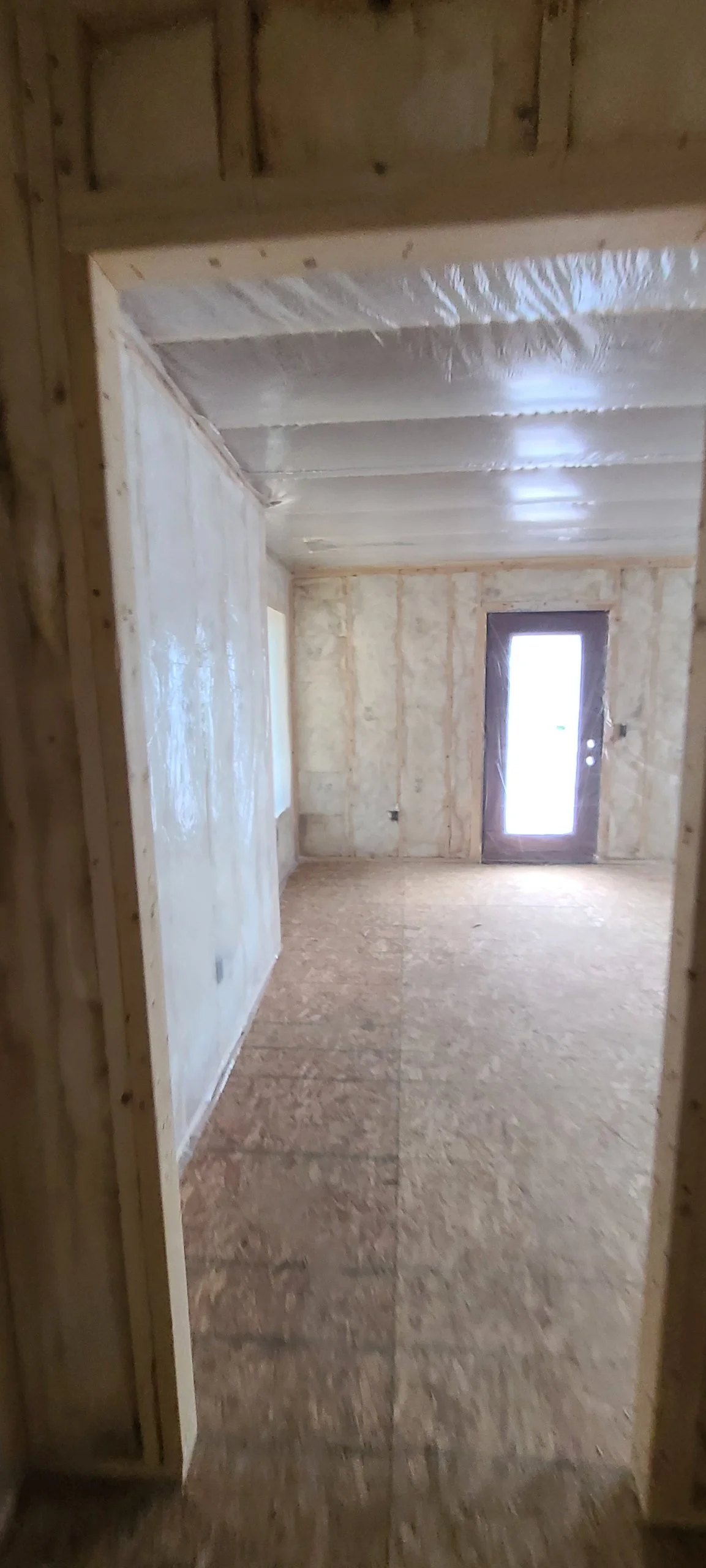 Fiberglass batting in the walls with a bibbed and blown cellulose ceiling