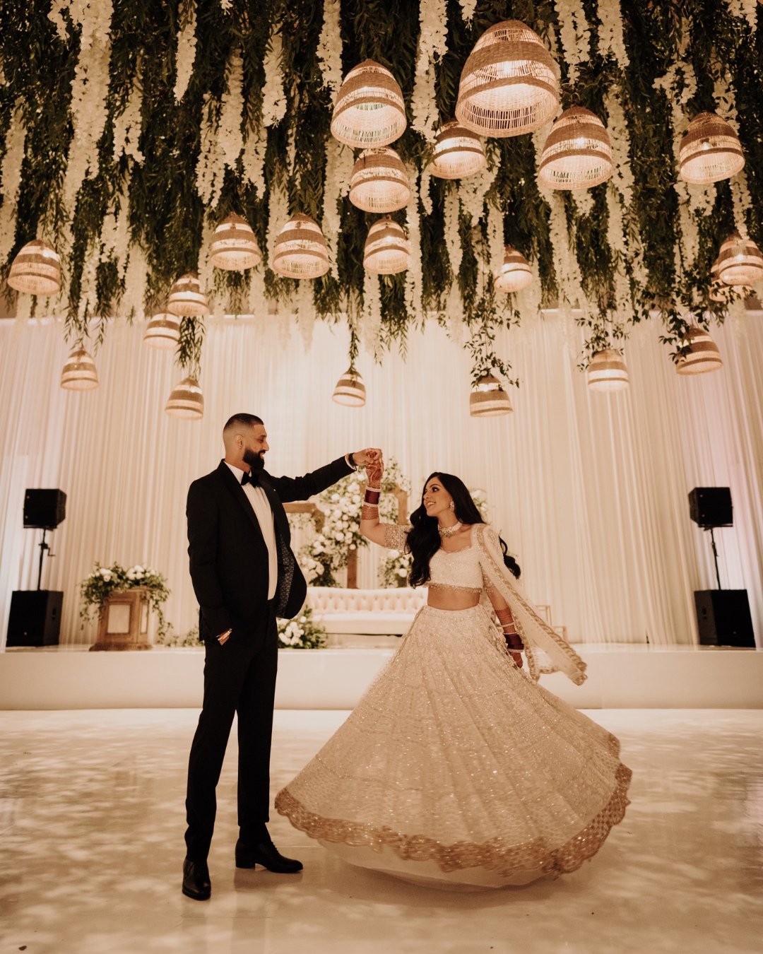 Multicultural weddings in LA are no longer about two separate ceremonies happening back to back. The 2026 shift is full integration: a Hindu blessing under a chuppah, a tea ceremony before a Western vow exchange, a baraat that walks straight into a b