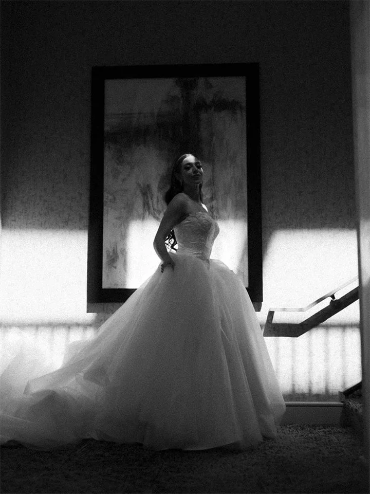 There is a version of confidence that doesn't need an audience.⁠
She isn't waiting to be seen.⁠
She already knows.⁠
The dress, the posture, the quiet certainty in her eyes.⁠
That's the energy a wedding day is built around.
