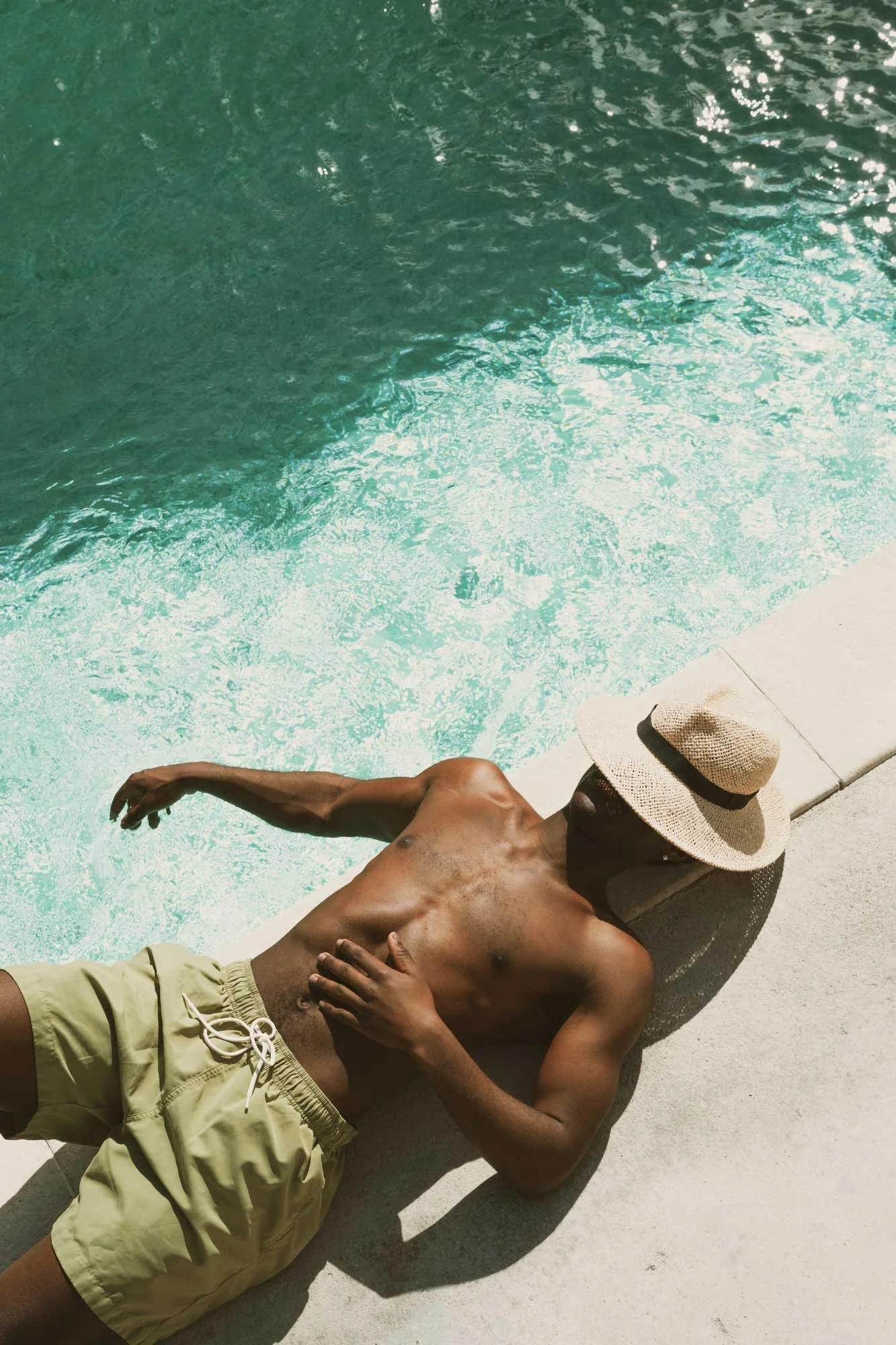 man sleeping by the pool in LA