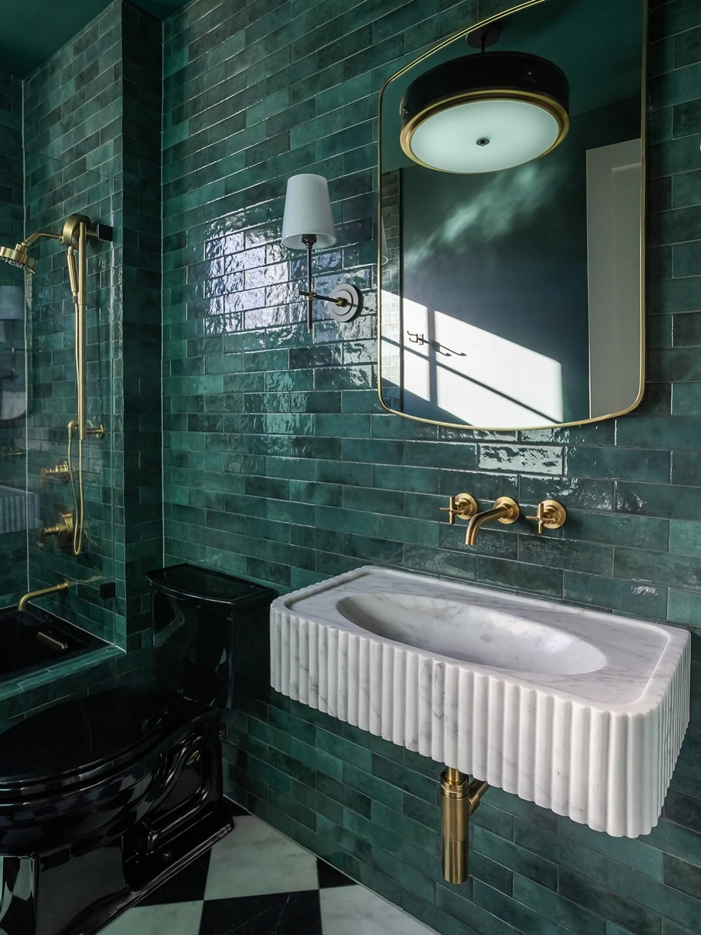 Feeling lucky? 🍀

This jewel-toned green tile moment is giving all the St. Patrick&rsquo;s Day vibes, rich, bold, and just a little bit magical. Paired with warm brass and sculptural details, it&rsquo;s proof that going green can be both timeless an