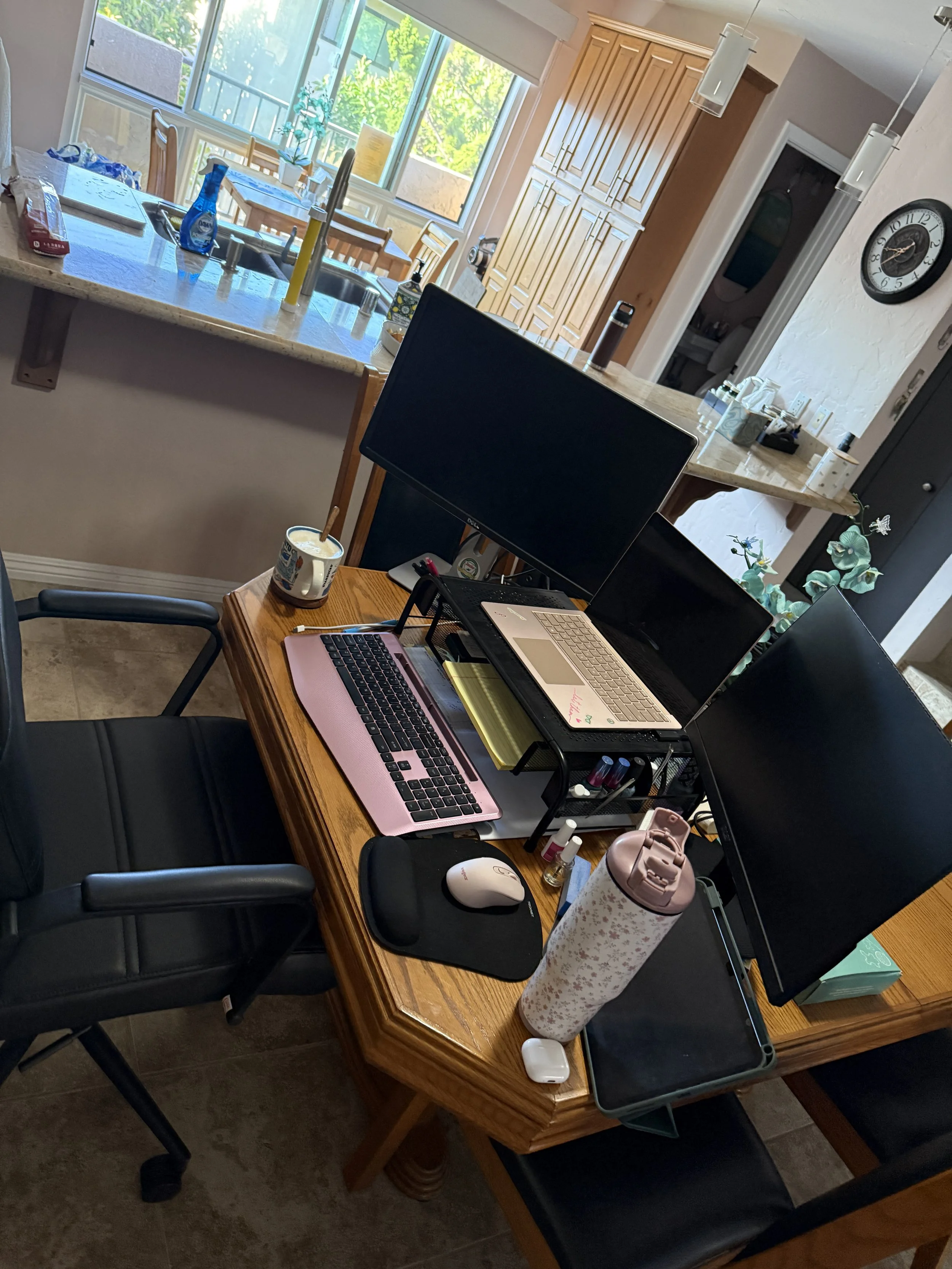 Our work setup from the dining room table—many options to choose from when it comes to your work zone in our Solana Beach vacation rental condo!