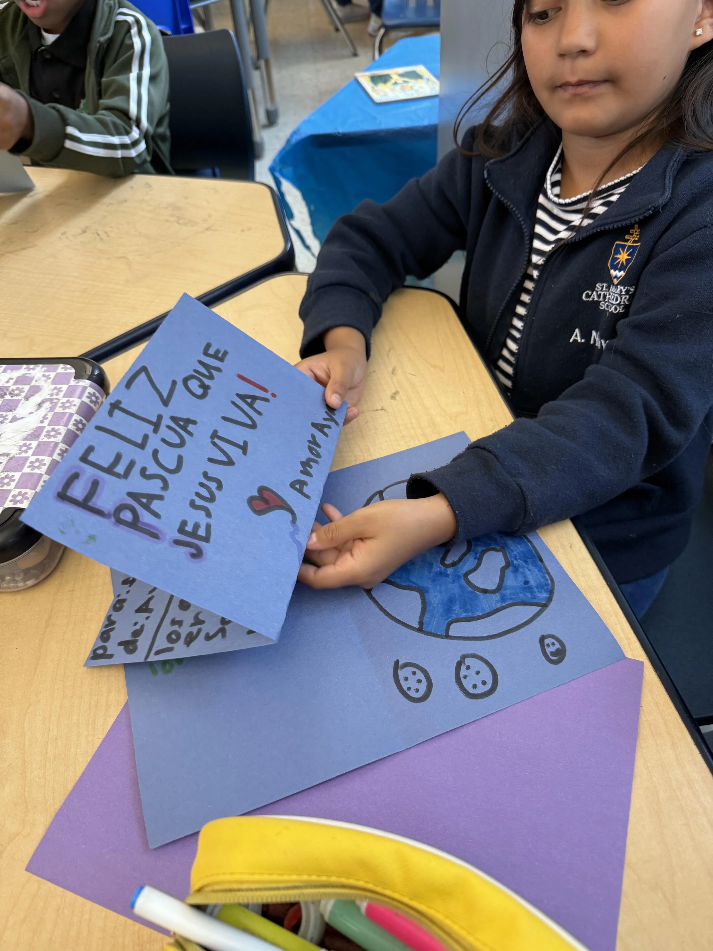Teacher working with students in classroom