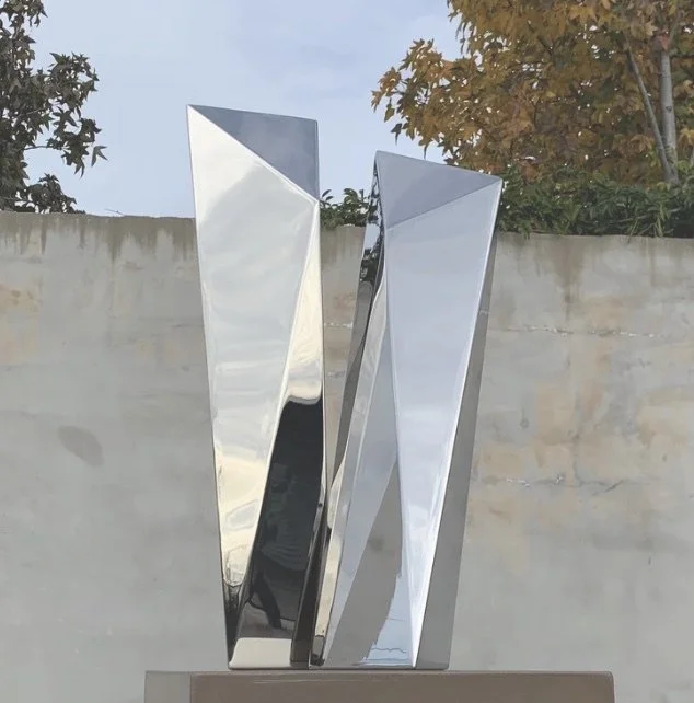 Tango Nuevo, Polished Stainless Steel,  32 x 23 x 17"