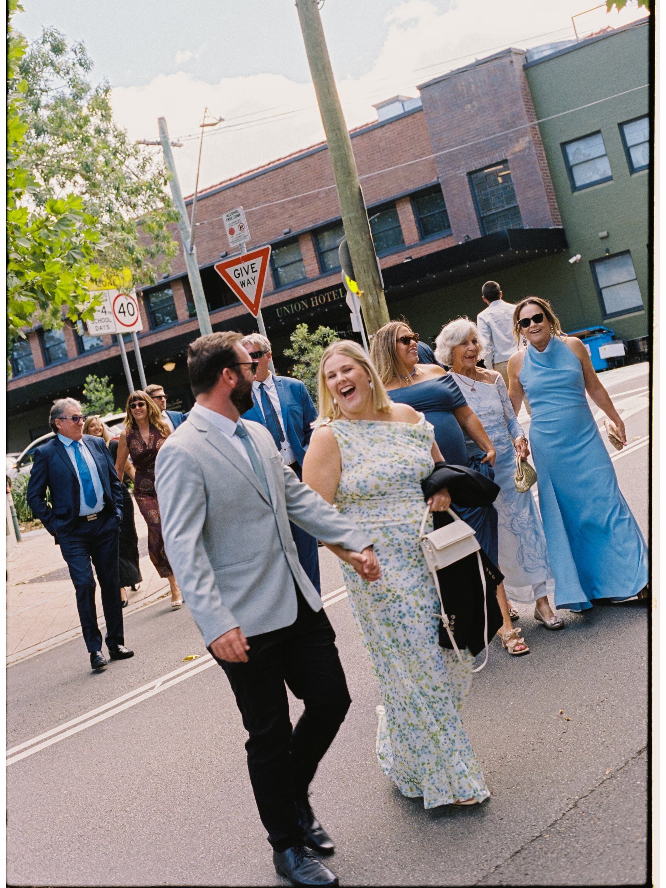 I spend a lot of time at weddings watching the people who aren&rsquo;t the couple. The ones on the edges of the frame, laughing at something I didn&rsquo;t hear, sitting in a quiet corner with someone they haven&rsquo;t seen in years. 

There&rsquo;s