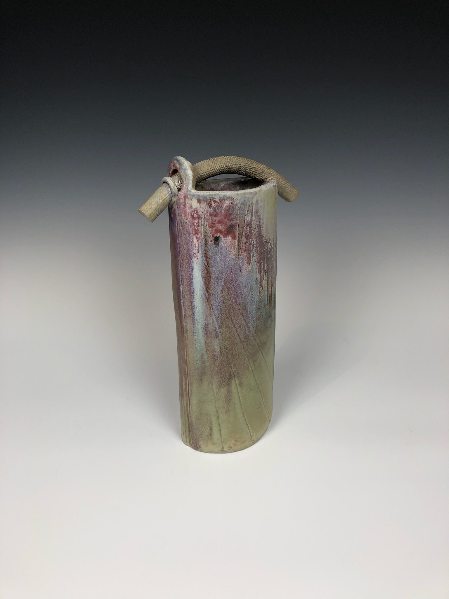 Slab built, wood fired with Oribe glaze