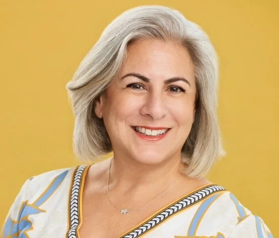 cropped yellow headshot.jpeg