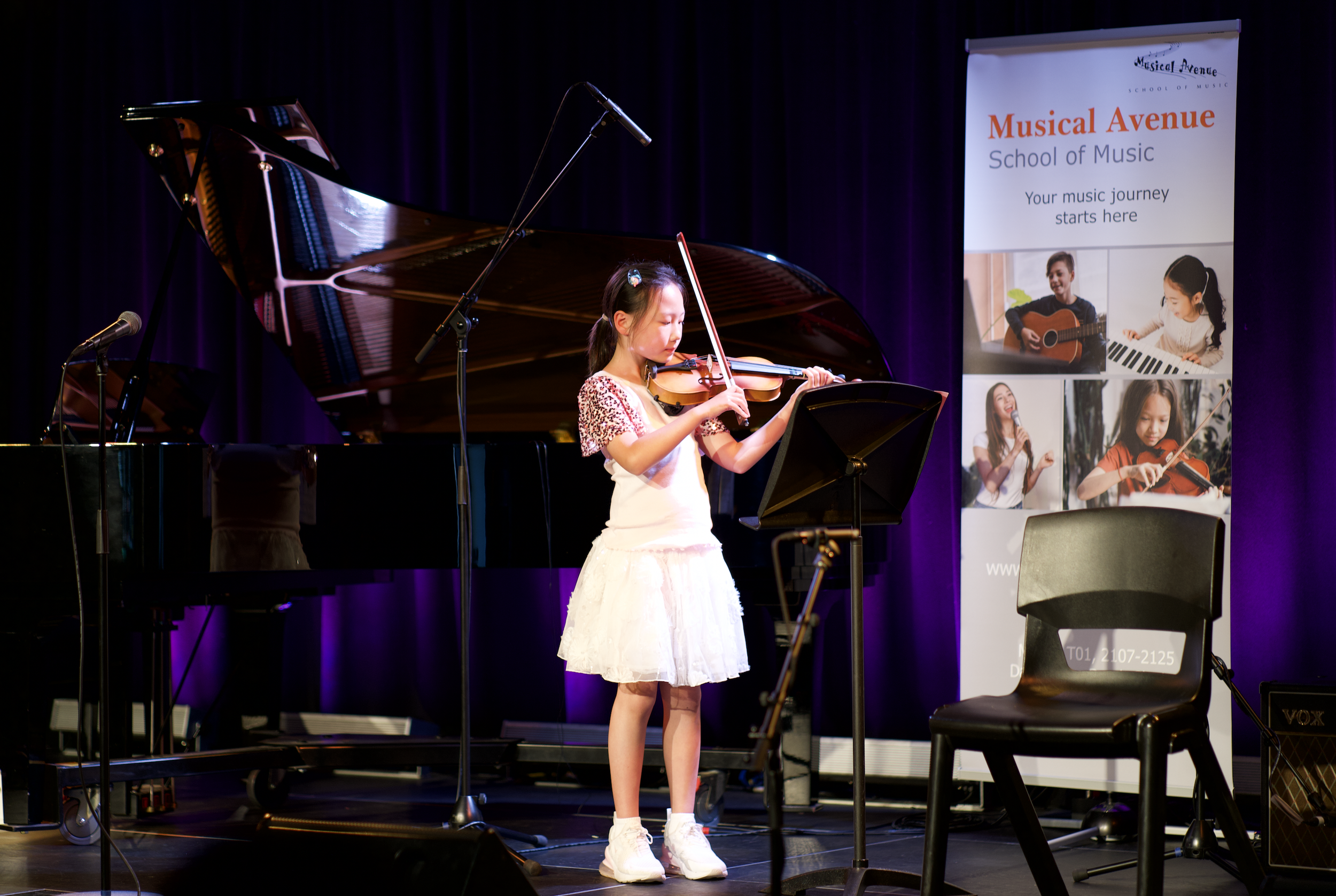 Violin student performing.png