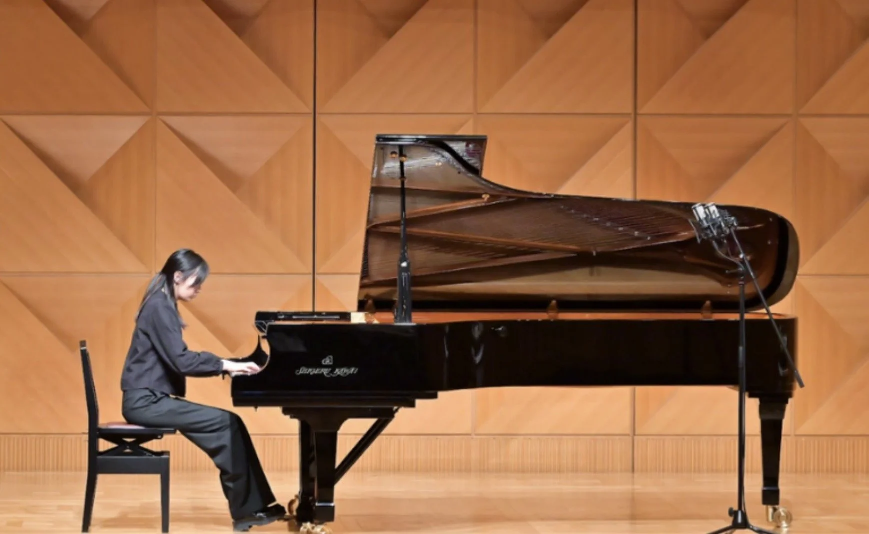 Teacher playing the piano