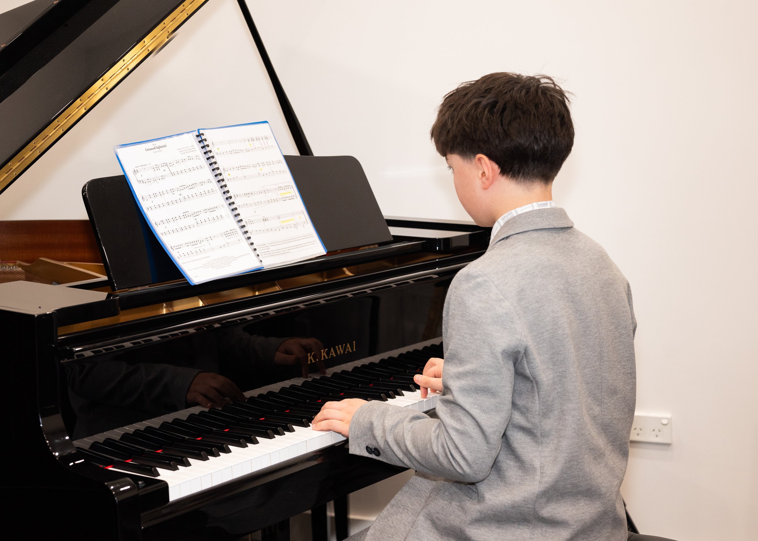 Boy playing the piano