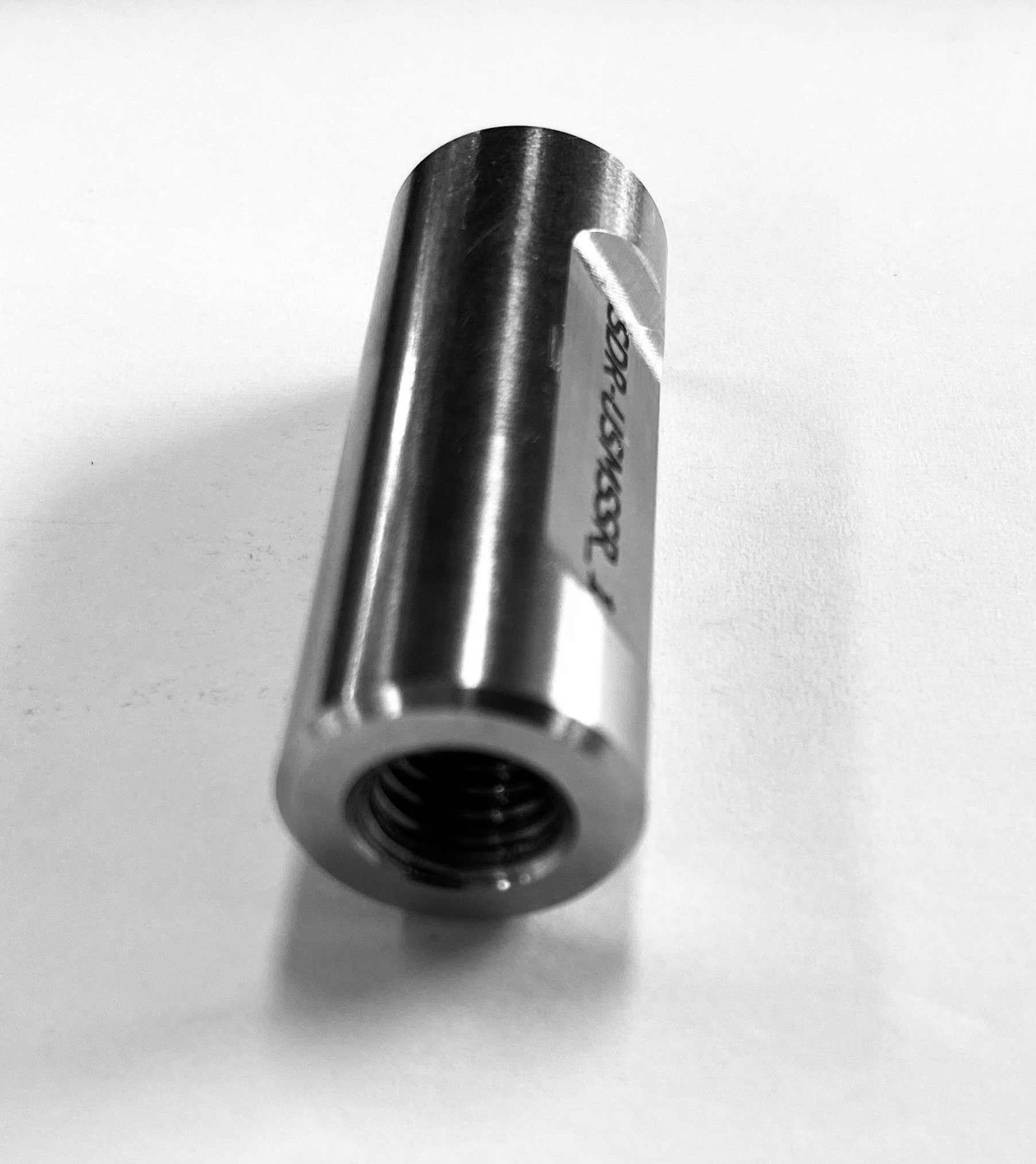 Threaded part machined from stainless steel round bar on Okuma CNC lathe and laser etched