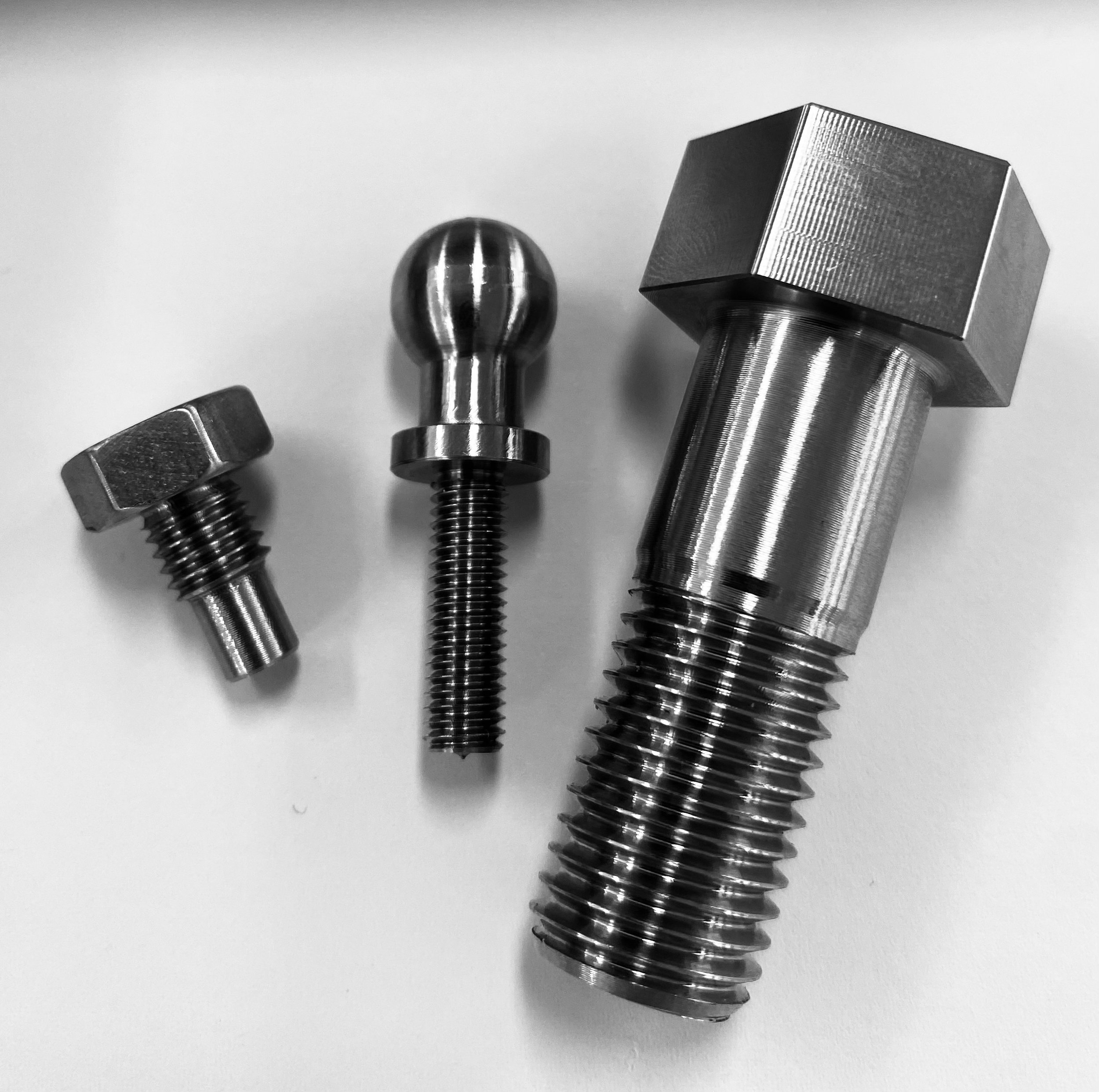 Bolts machined from stainless steel round bar on Okuma CNC lathe 