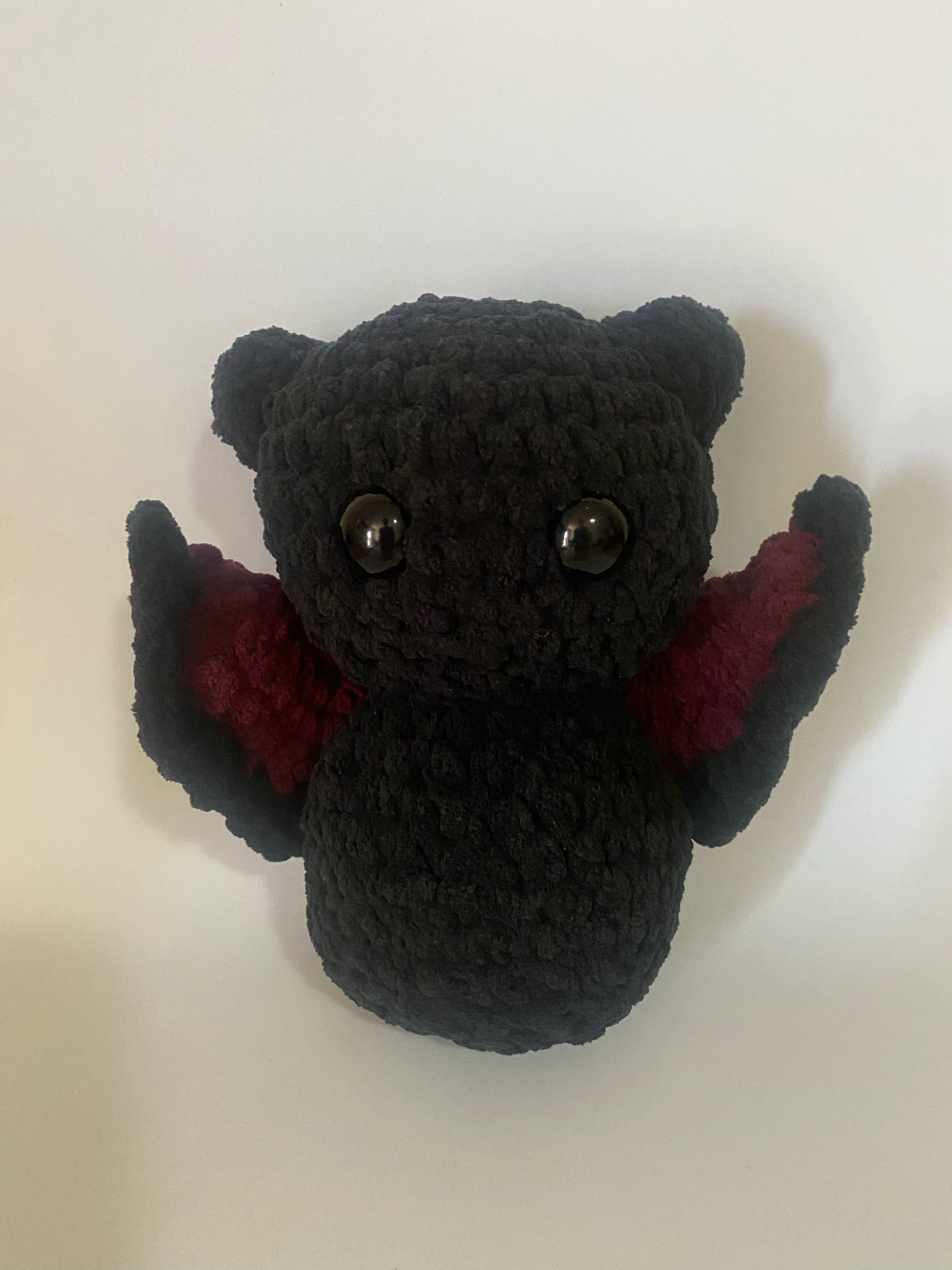 Black and Maroon Bat