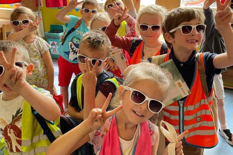 Einde schooljaar door een zonnige bril