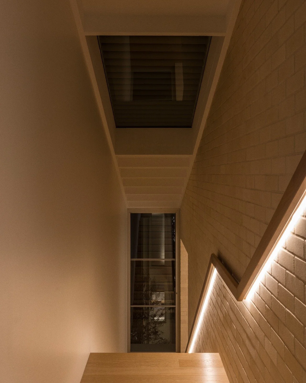 When lighting is an afterthought, the design always tells on itself.
Retrofit lighting often tells on itself - cutting into clean lines, competing with materials, and disrupting architectural flow.
These compromises happen when lighting is left to