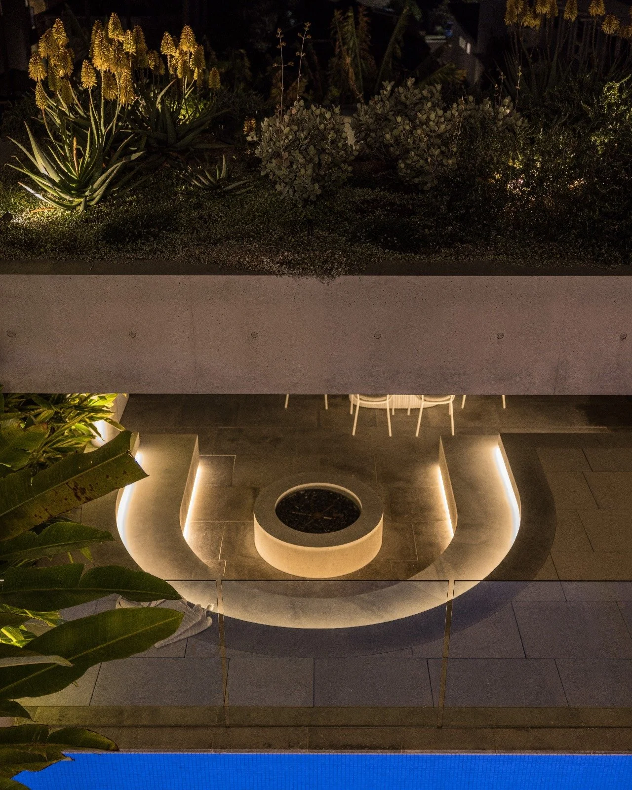 Light isn’t just functional - it’s the essence of atmosphere.
Lighting is not simply a tool to reveal architecture, it is the element that gives it emotion. 
A dining room can transform from vibrant and celebratory to intimate and calm,