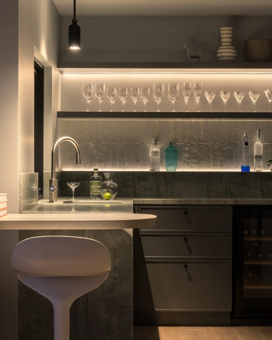 Lighting Artwork and Objet D'art
Lesson 6 - Lighting Glass Through Transmission

Glass comes to life when light passes through it, not merely onto it.

Front lighting alone often leaves glass feeling flat and unresolved, revealing little of its inher